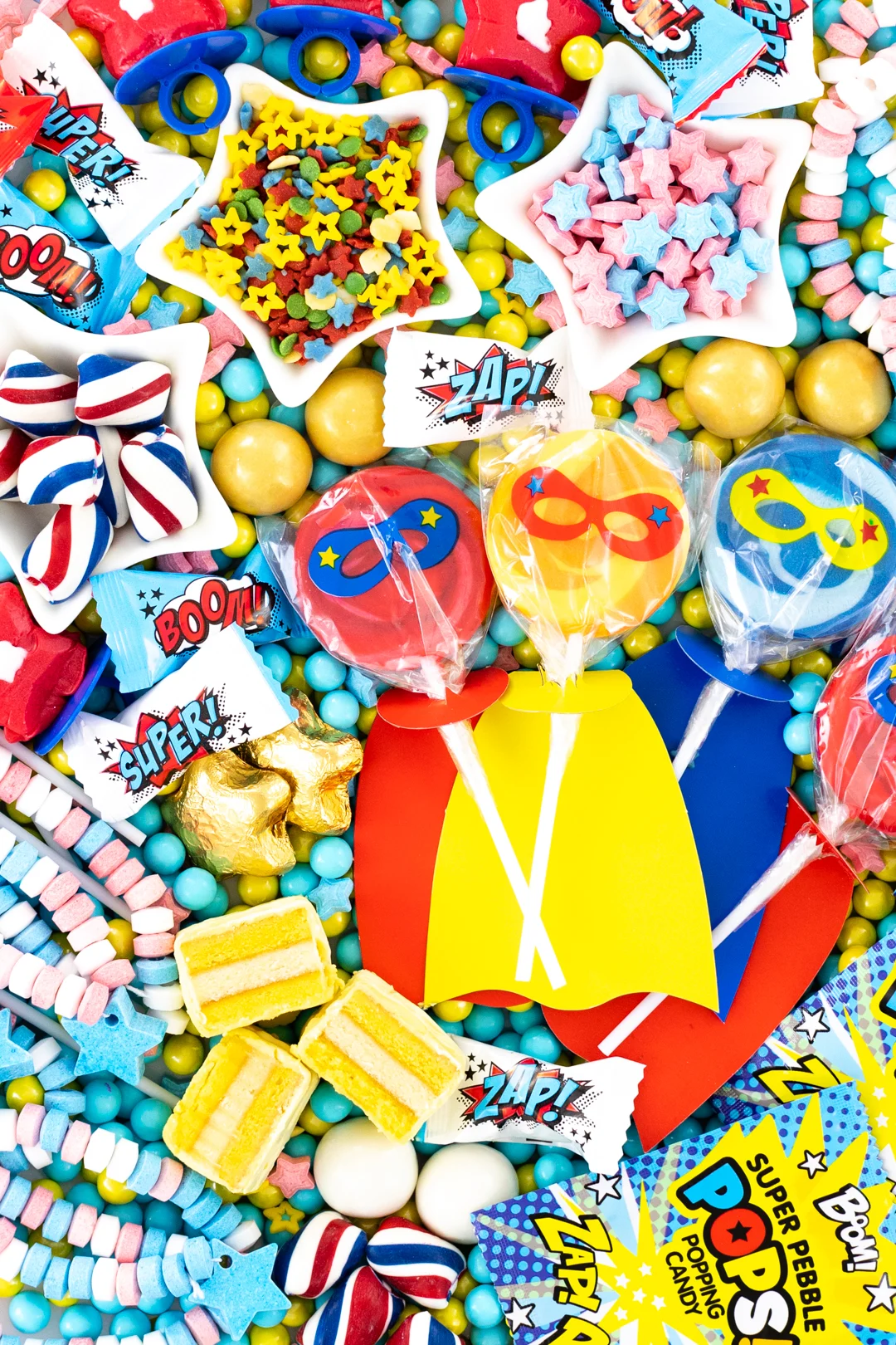 superhero candies, lollipops, cakes, candy sticks and buttermints