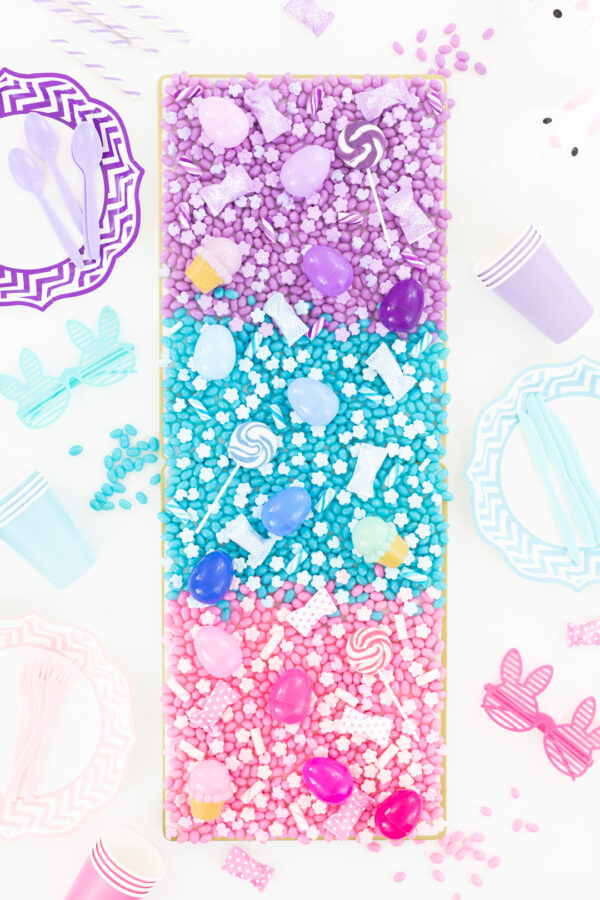 all candy easter tablescape with jelly beans and easter eggs