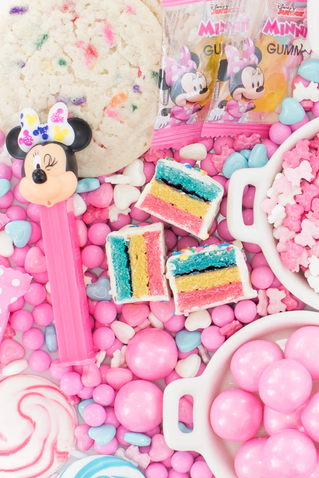 candy tray up close with minnie mouse pez dispenser and cakebites party cake