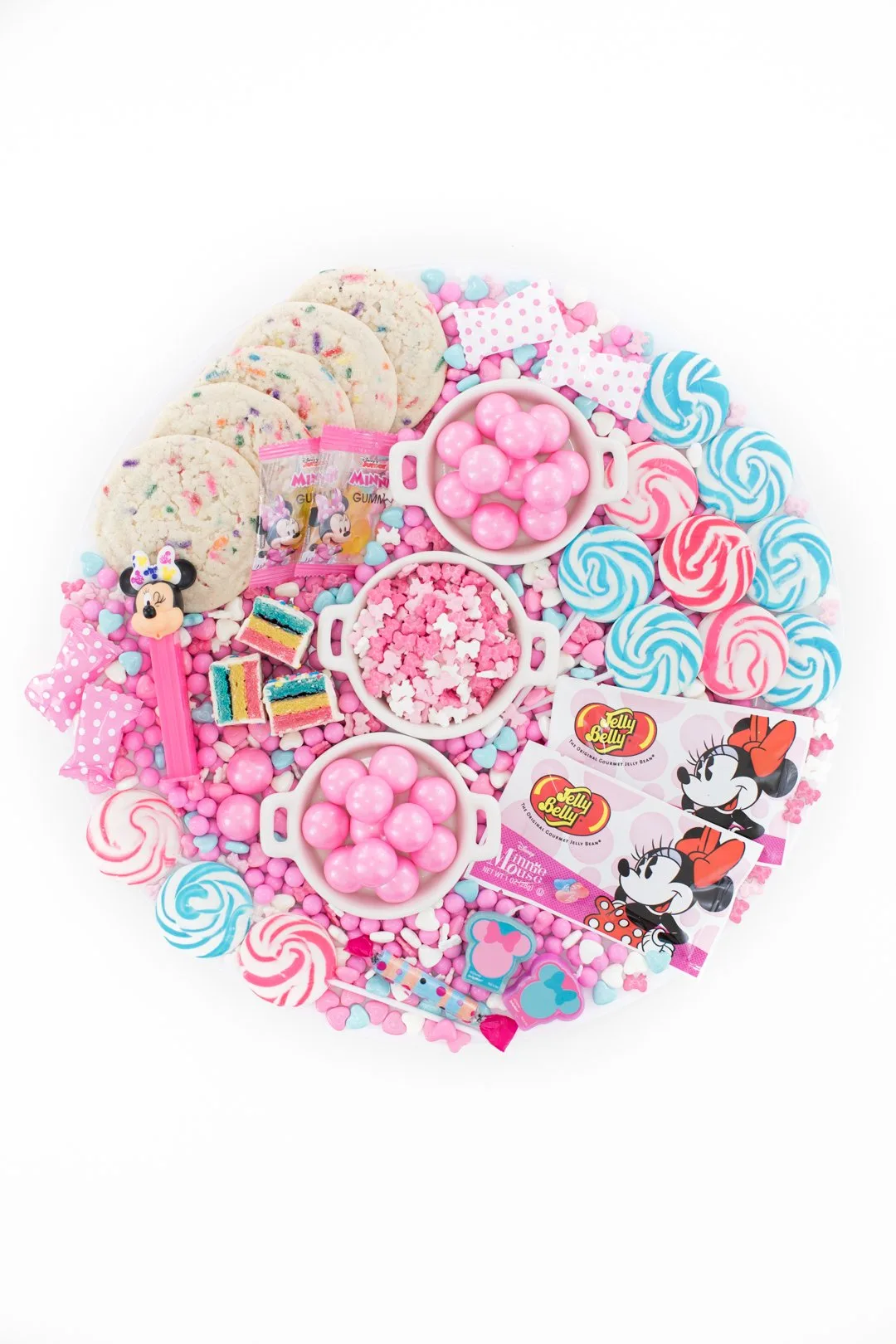 disney minnie mouse candy charcuterie board with pink and blue candies