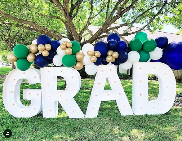 drive by graduation sign for social distancing celebration