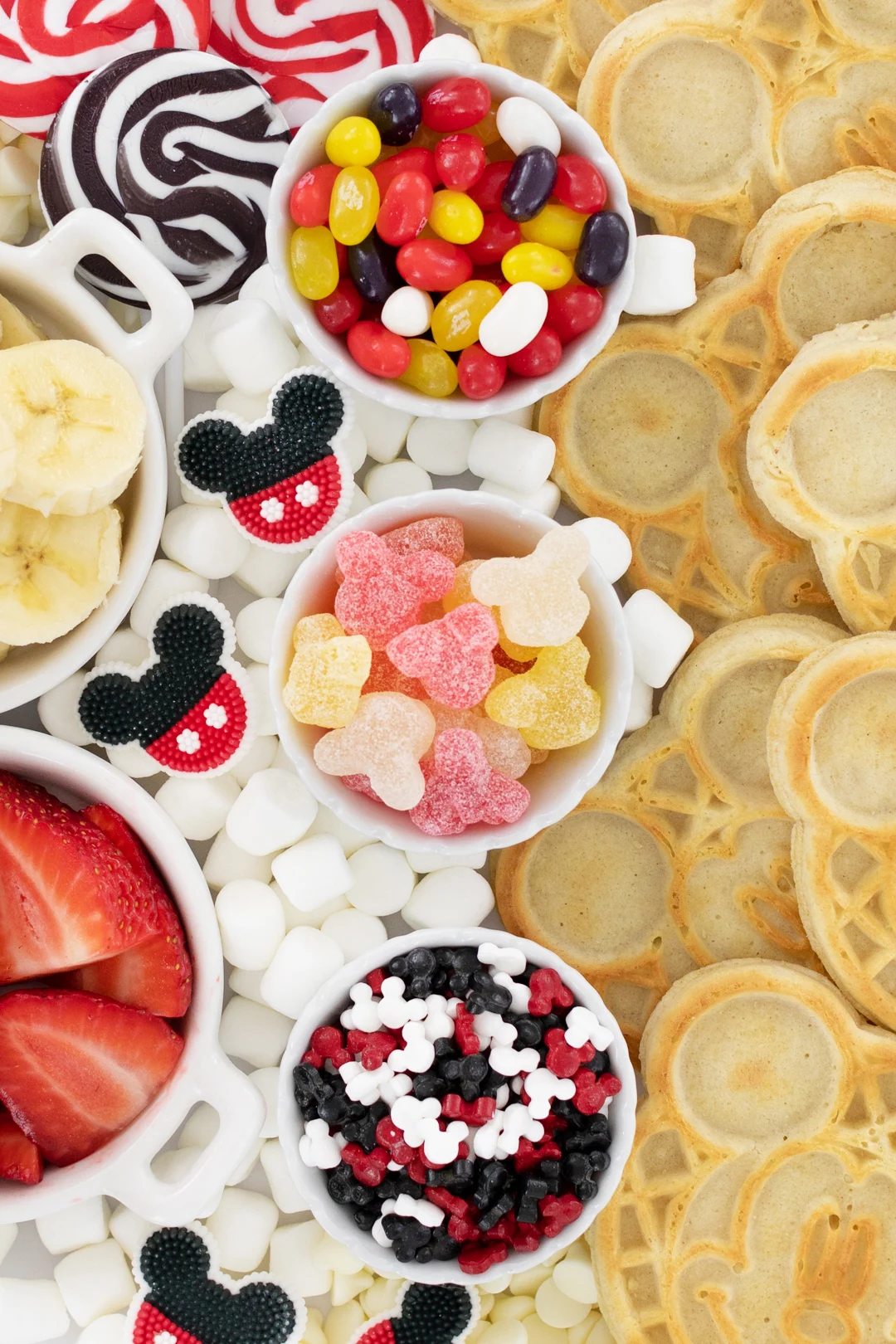 mickey mouse sprinkles, candies and jelly beans up close