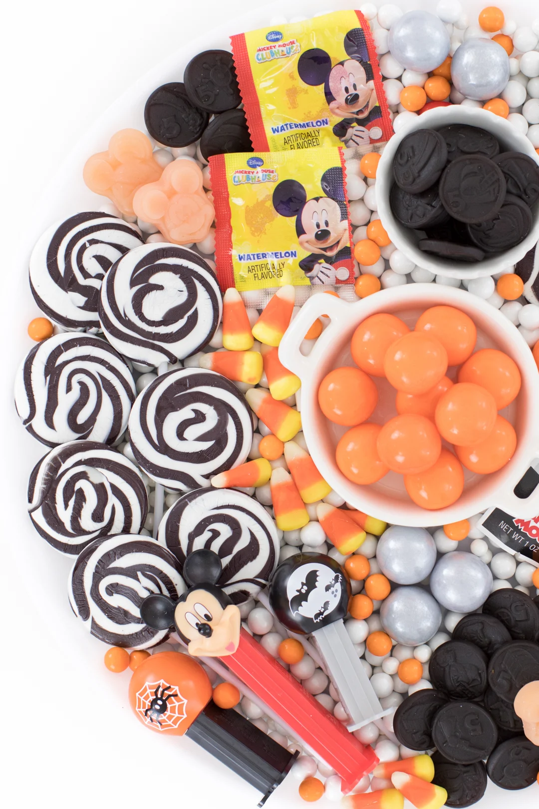 Black, white and orange themed halloween candy platter with Mickey Mouse theme.