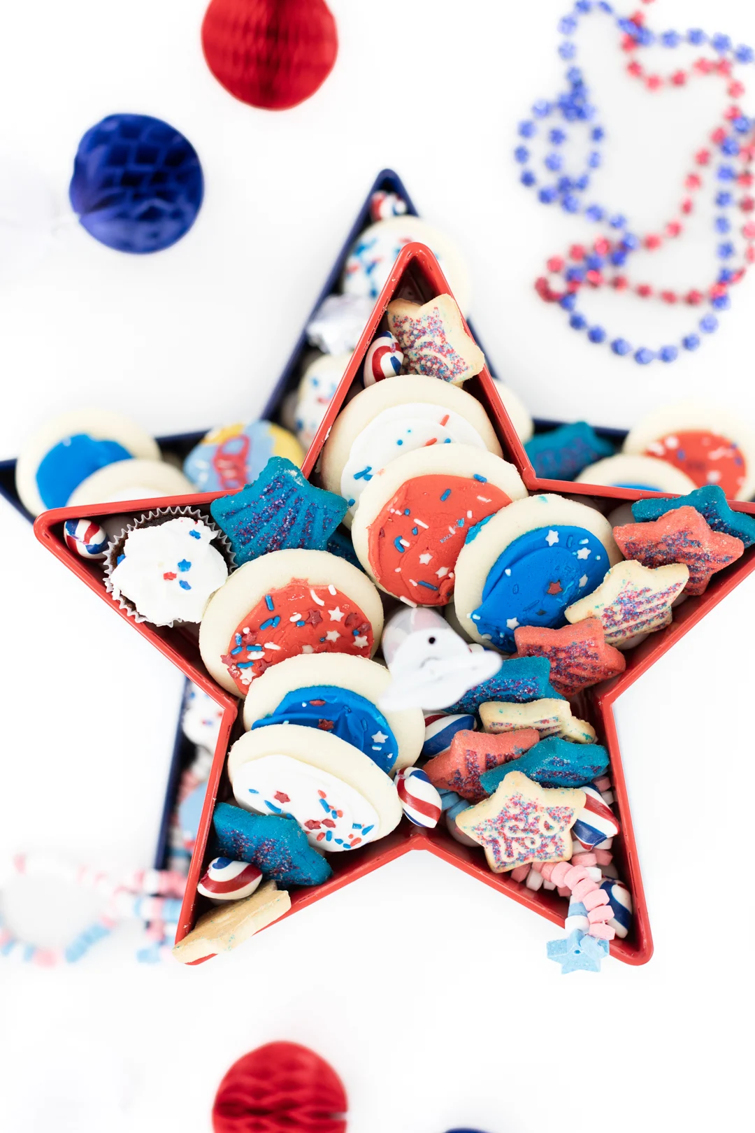 over top look at a tiered tray of patriotic themed desserts