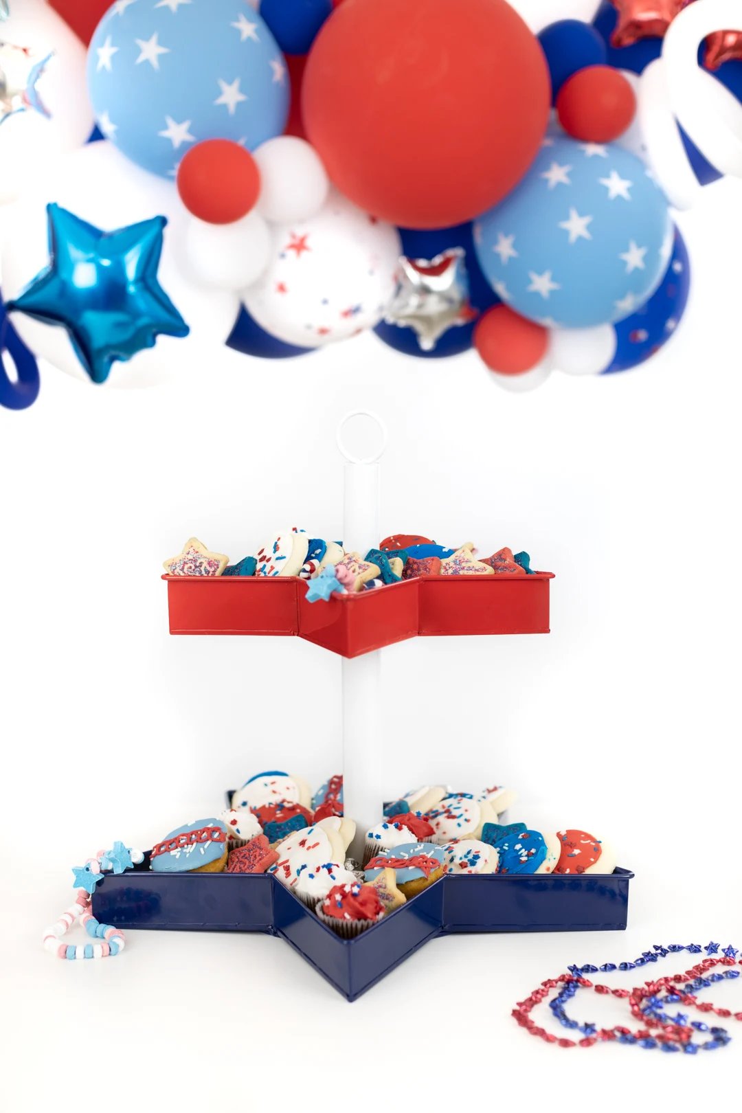 patriotic tiered serving tray filled with sweets