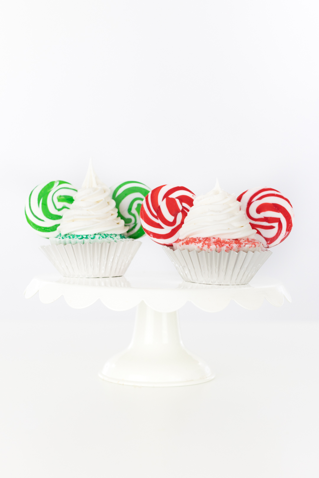 cute disney christmas cupcakes with big swirl lollipop ears