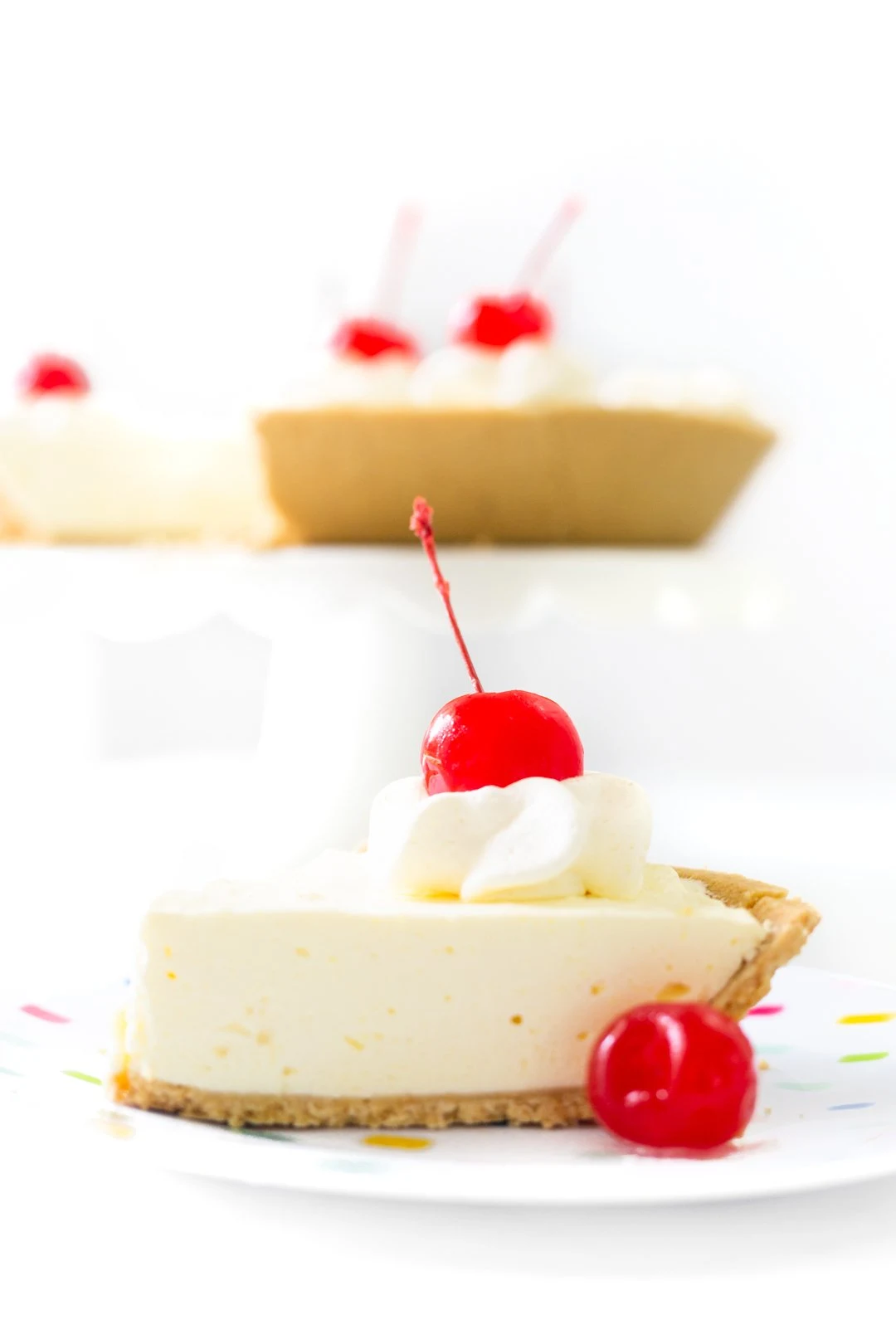 Easy Jello Pie Slice with whipped cream and cherries