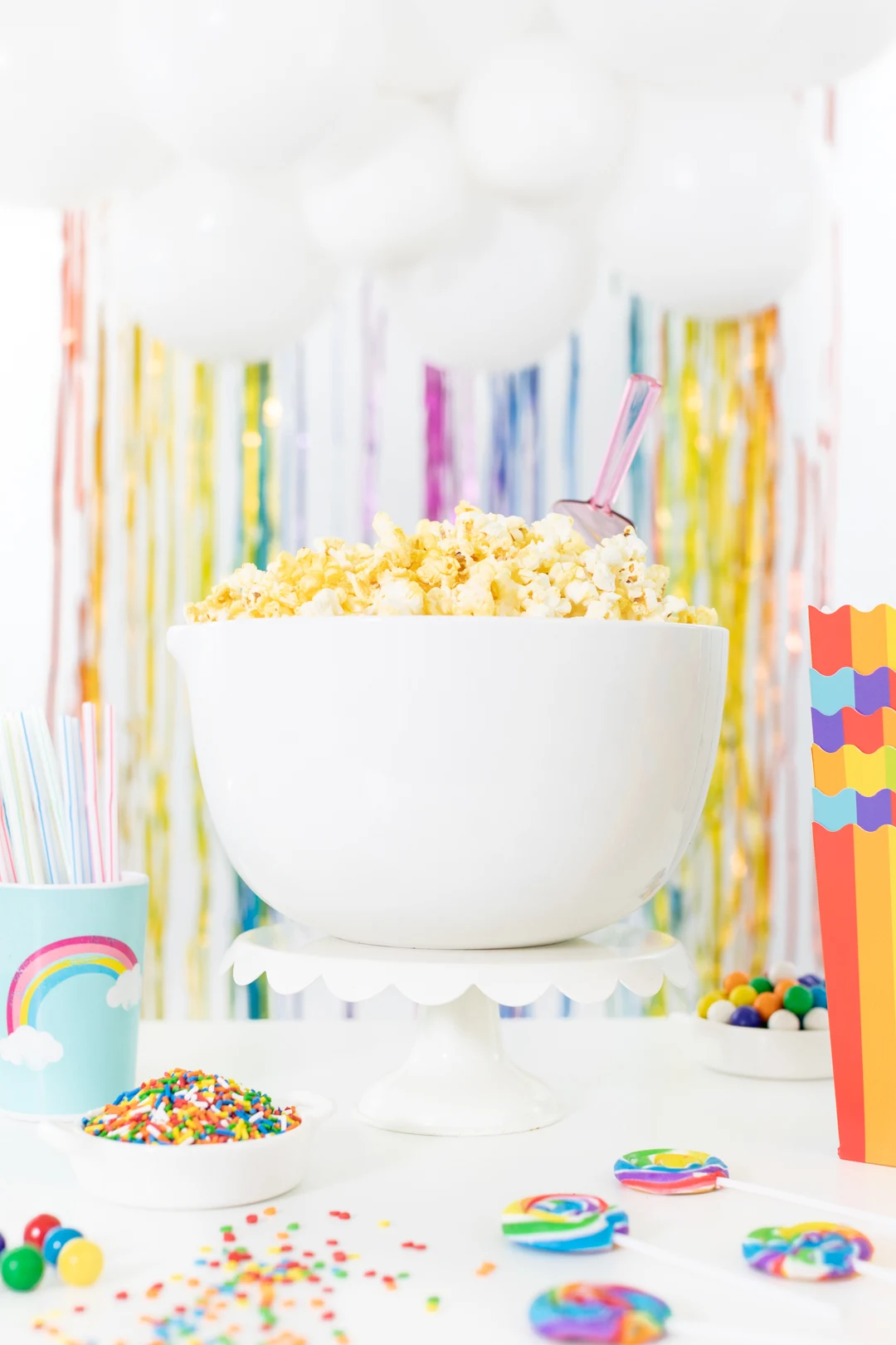 big bowl of party for rainbow popcorn bar