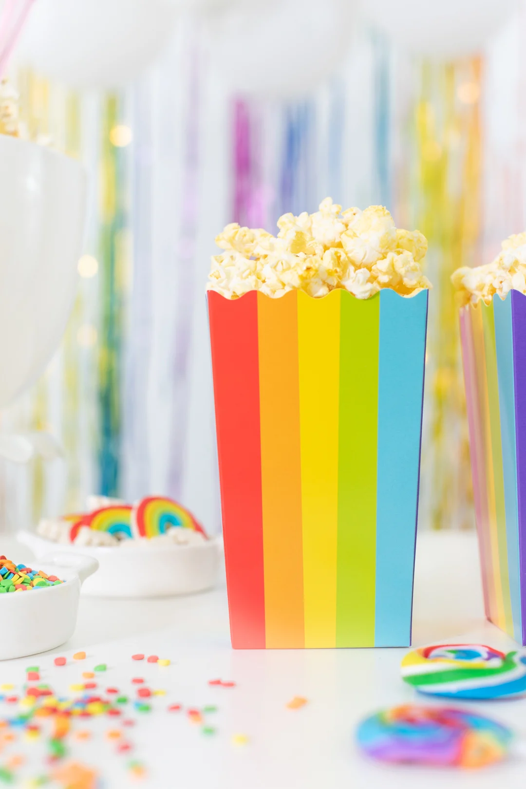perfect rainbow party snack. Rainbow popcorn bucket.