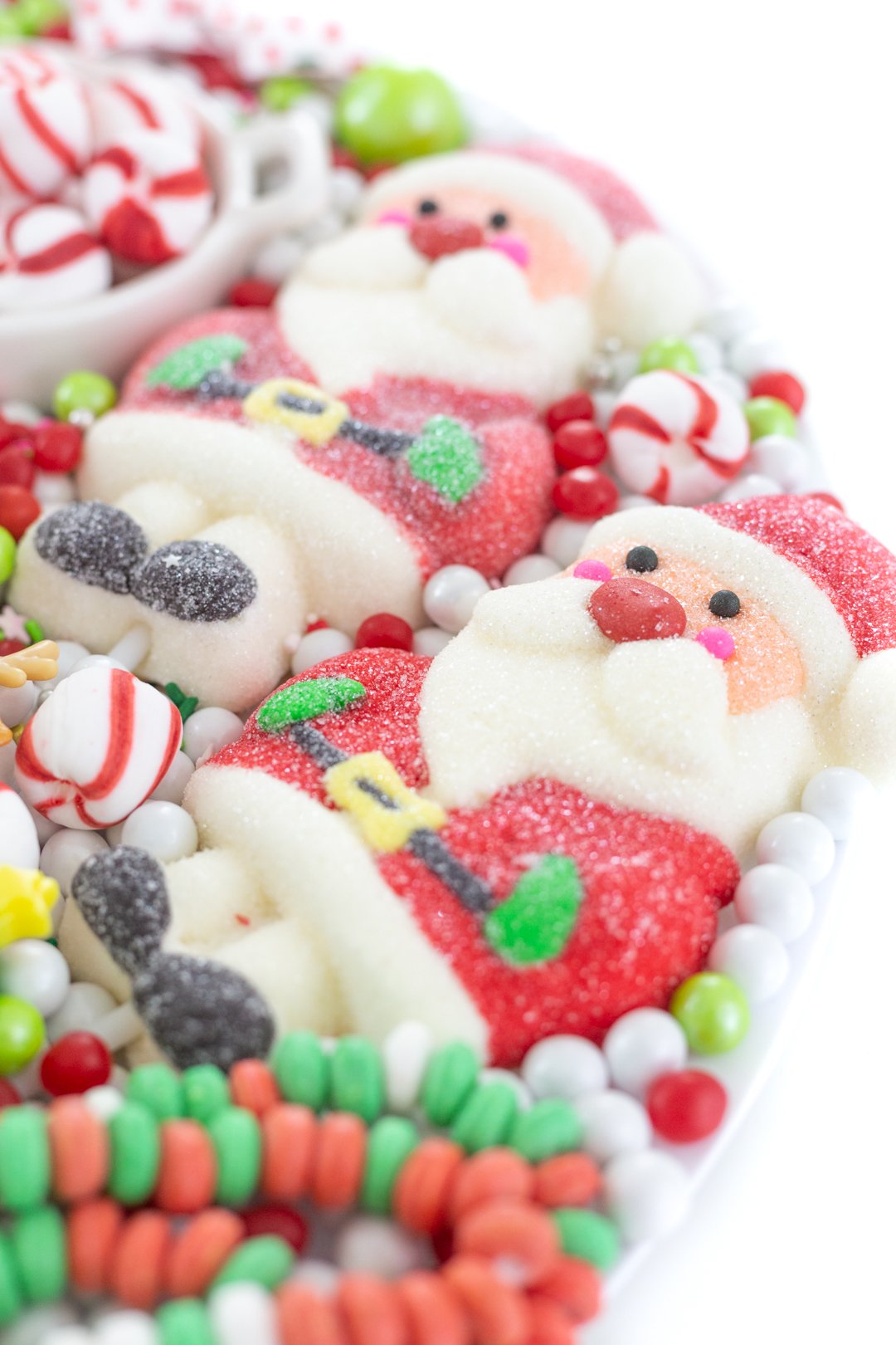 up close of dylan's candy bar santa marshmallow lollipops. 