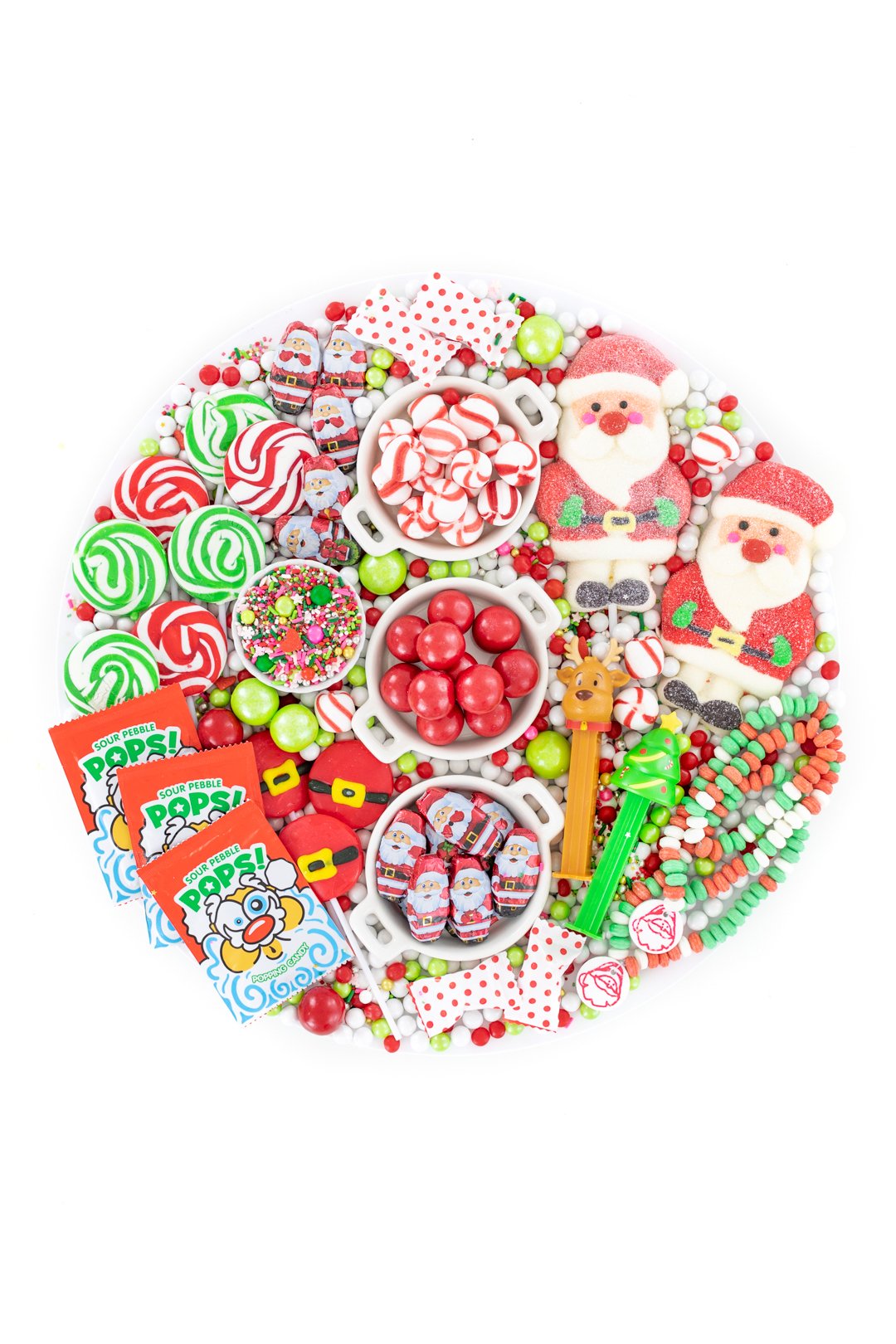 cute candy board for christmas with santa themed candies