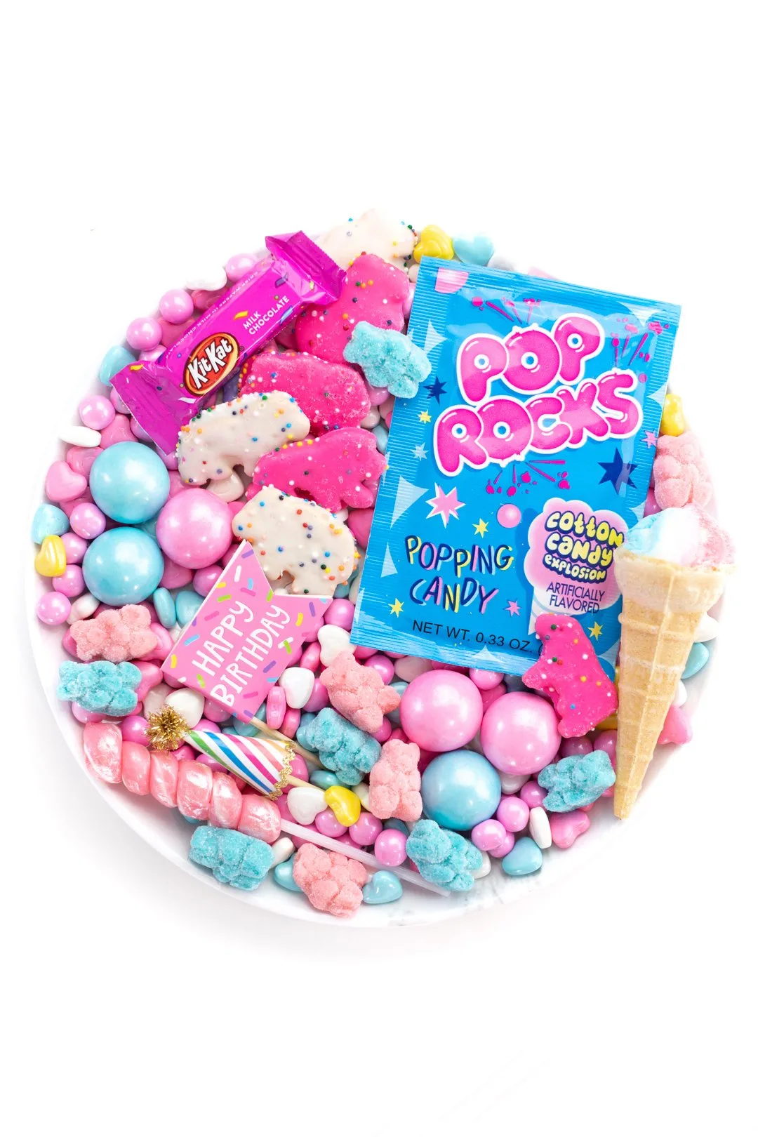 cute blue and pink candy board for one with ice cream cone candy, gumballs, lollipops and circus cookies