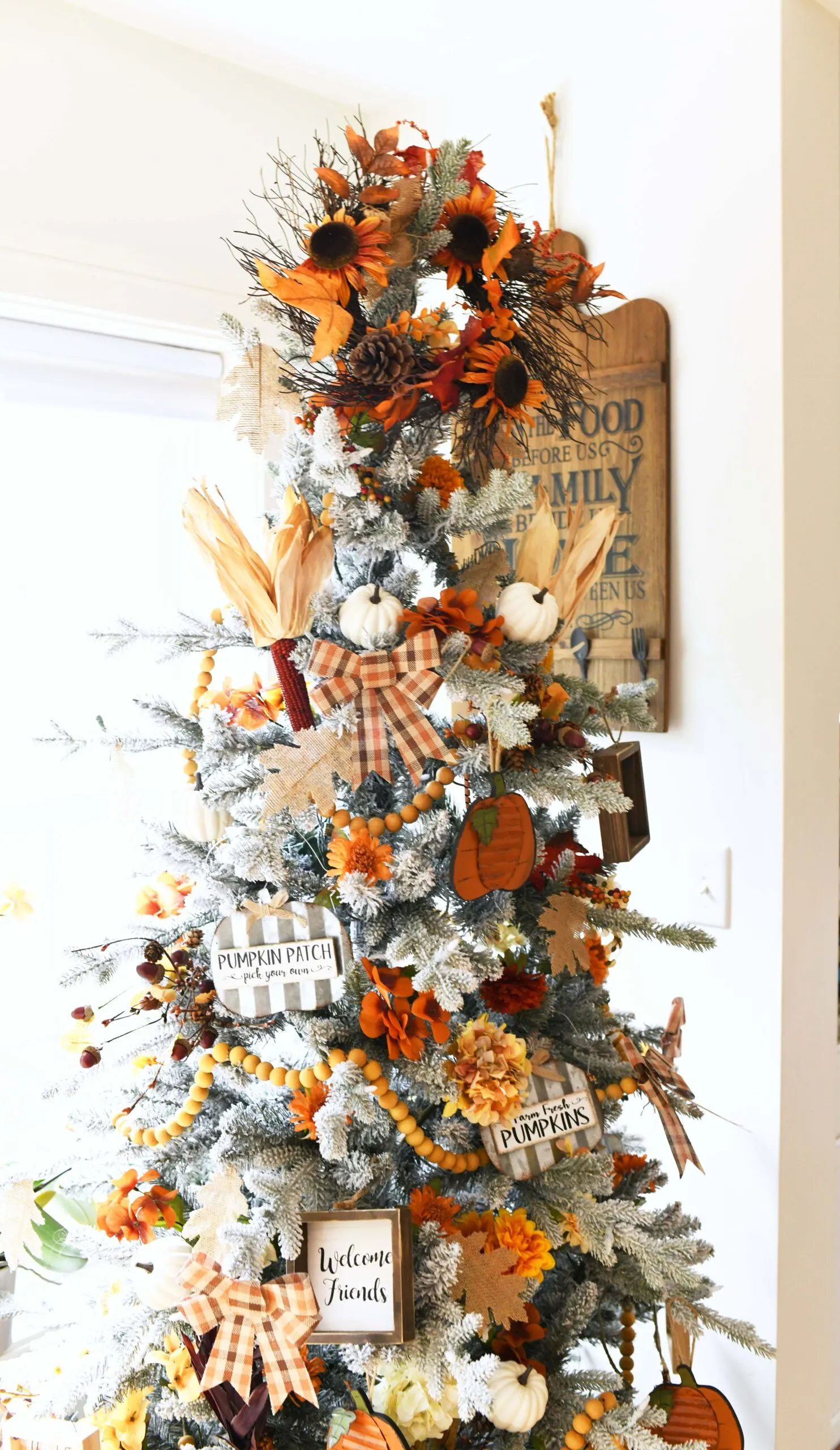 fall inspired christmas tree with earthy fall tones