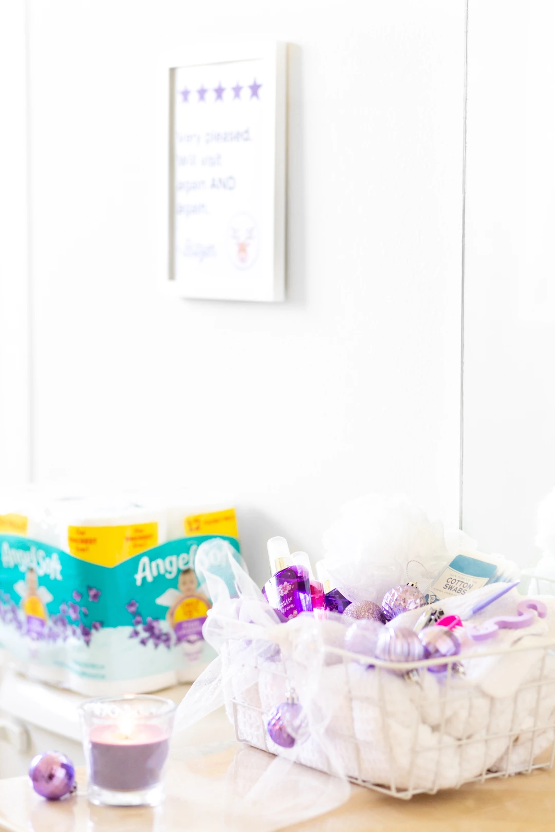pretty holiday guest bathroom refresh with printable sign, candles and toiletries basket