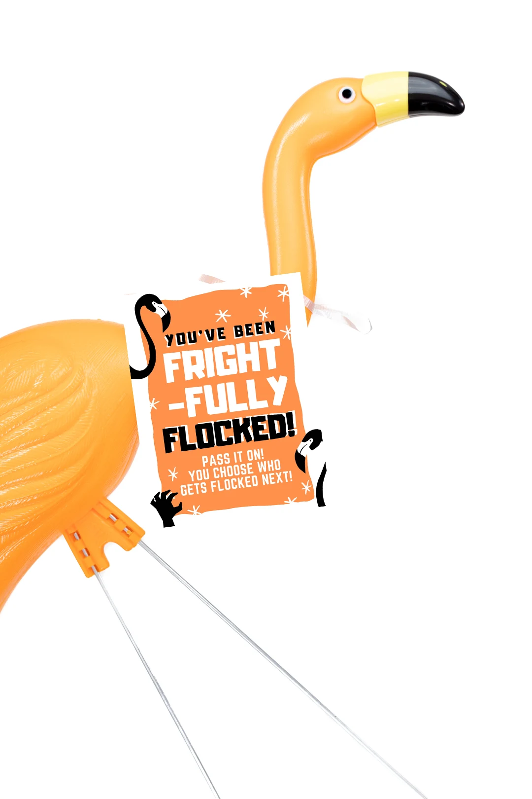 orange halloween flamingo with a you've been flocked sign