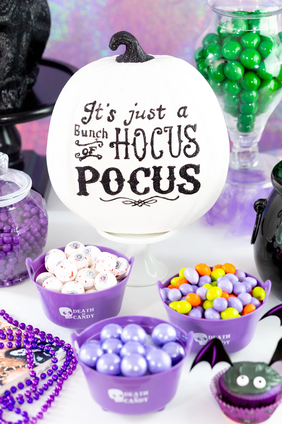hocus pocus themed candy buffet with purple candies