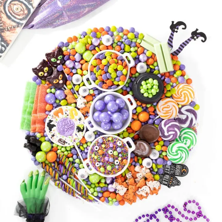 hocus pocus candy chartcuterie board for halloween. Eyeball gumballs, witch kitkats