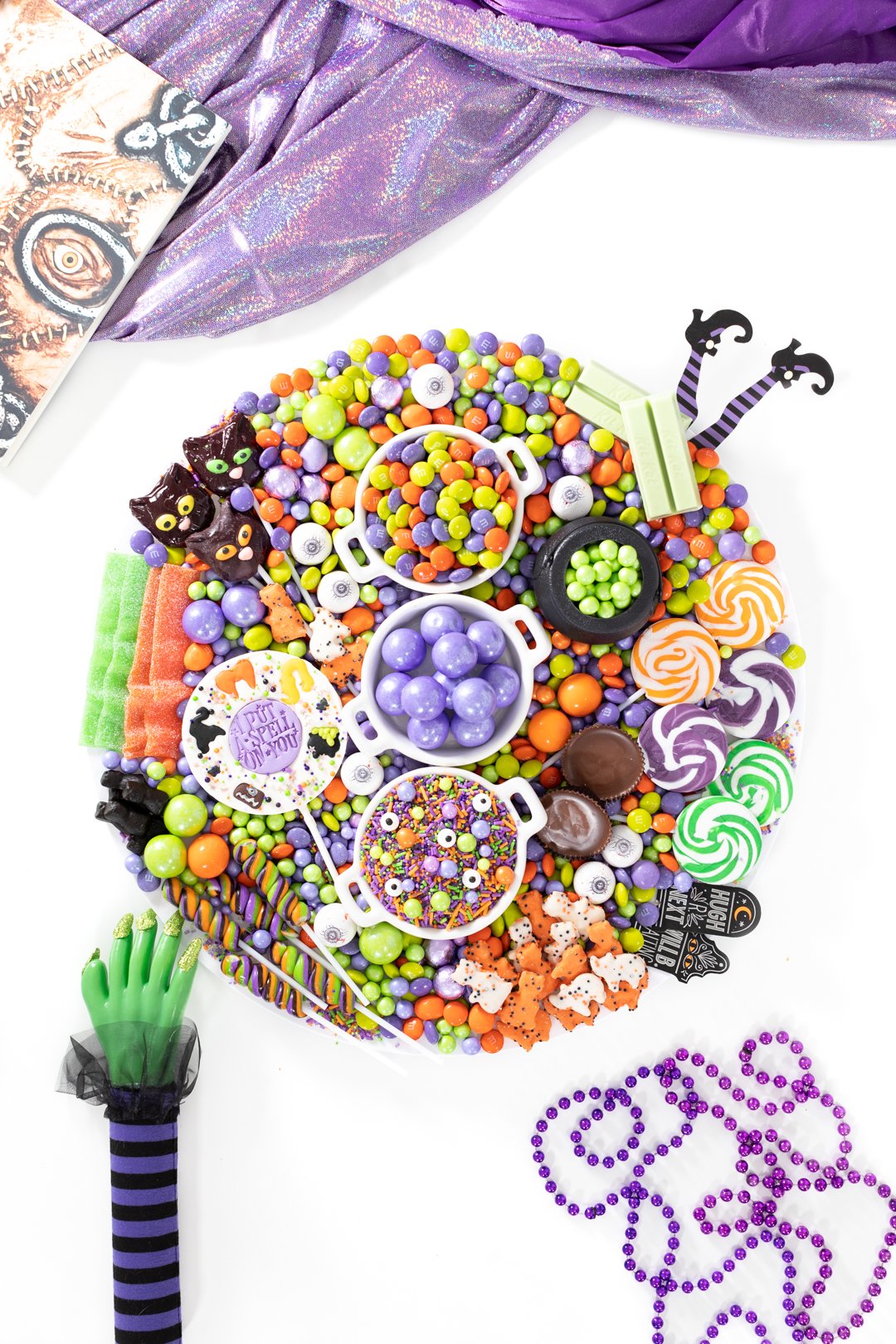 hocus pocus candy chartcuterie board for halloween. Eyeball gumballs, witch kitkats
