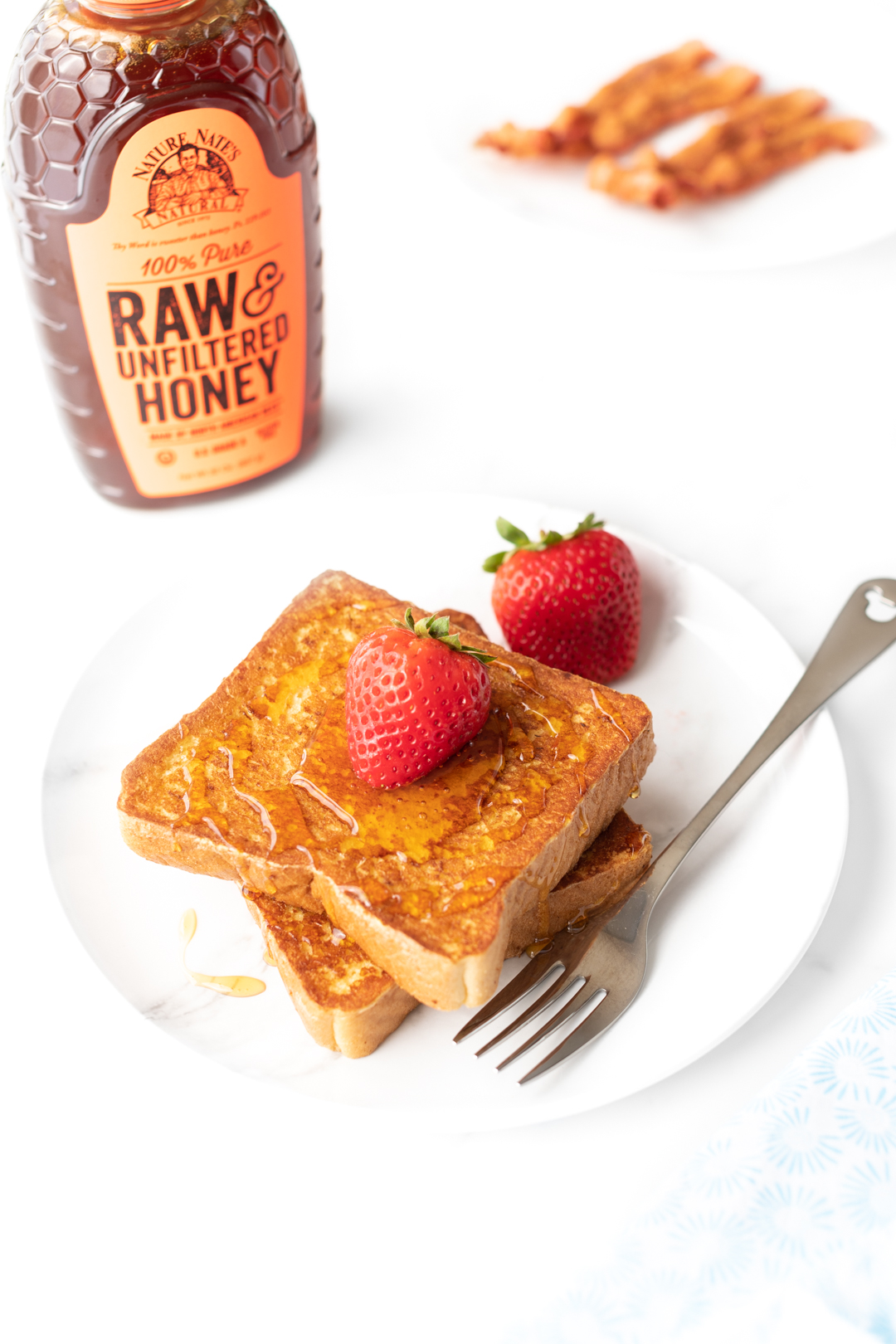 french toast with fresh strawberry on top