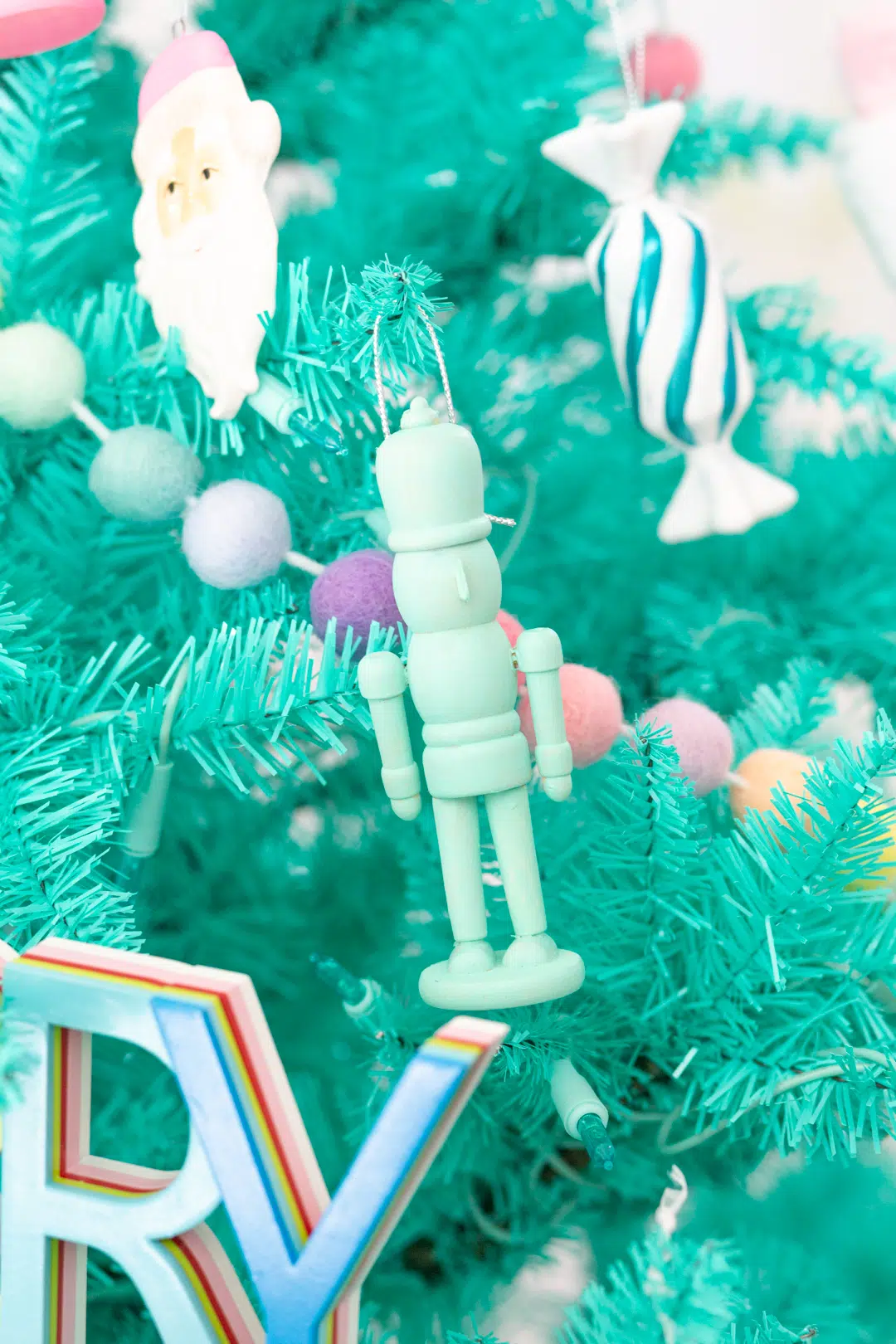 teal painted nutcracker ornament