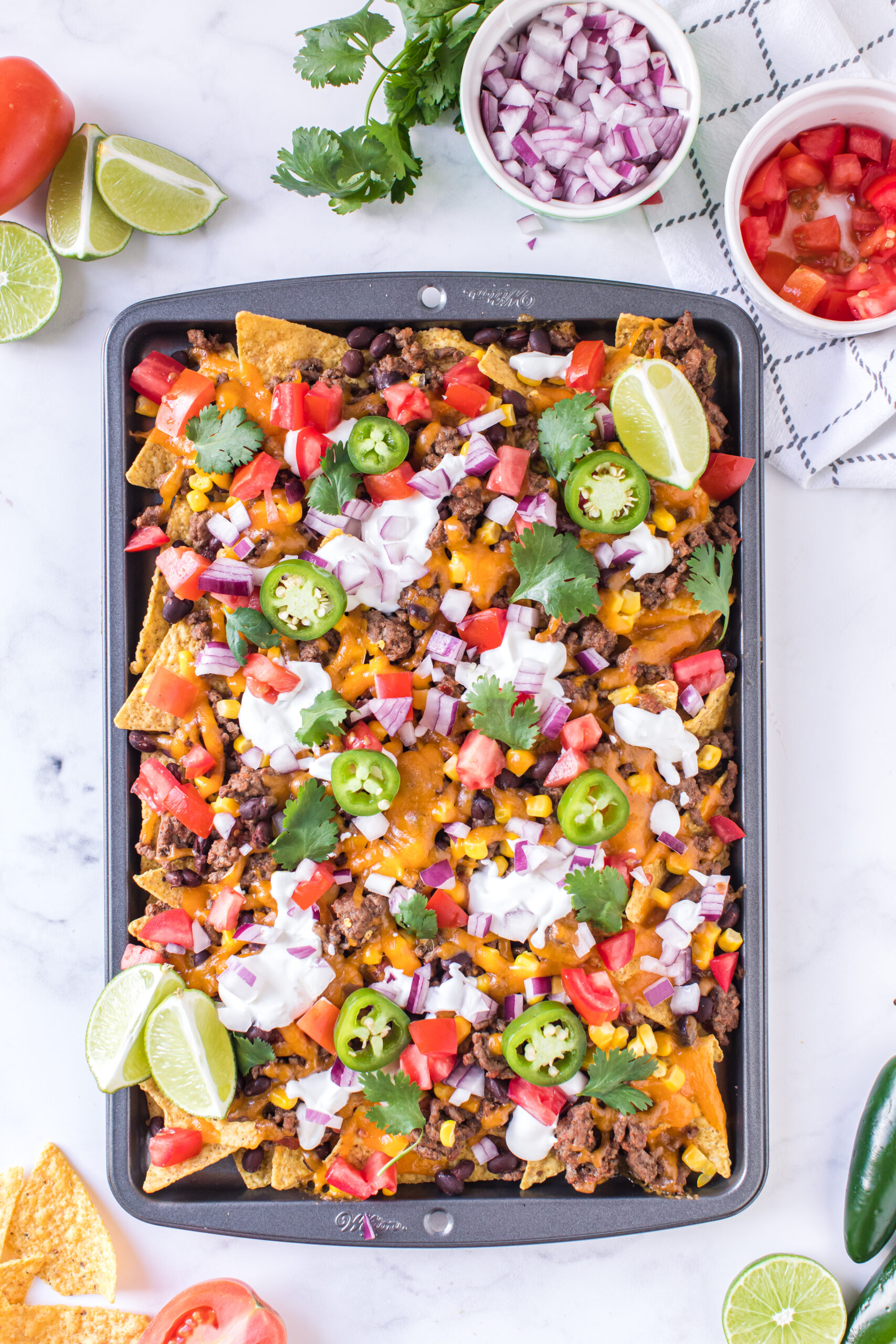 toppings added to baked nachos