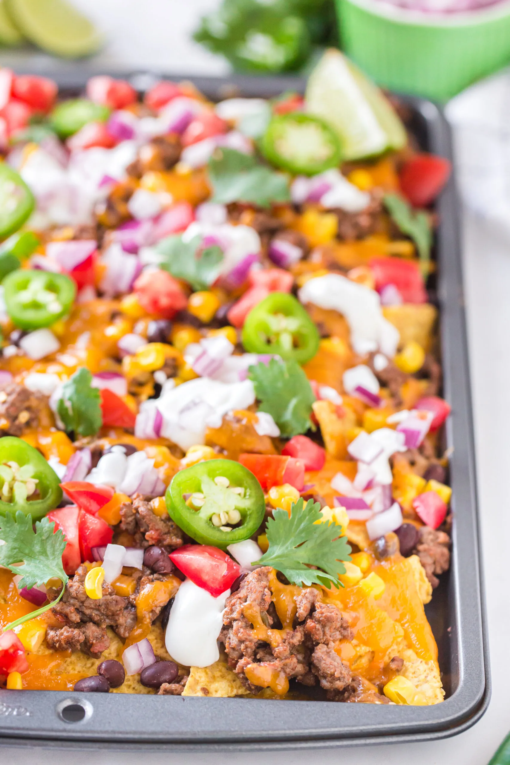 Easy Sheet Pan Nachos with Queso - Peas and Crayons