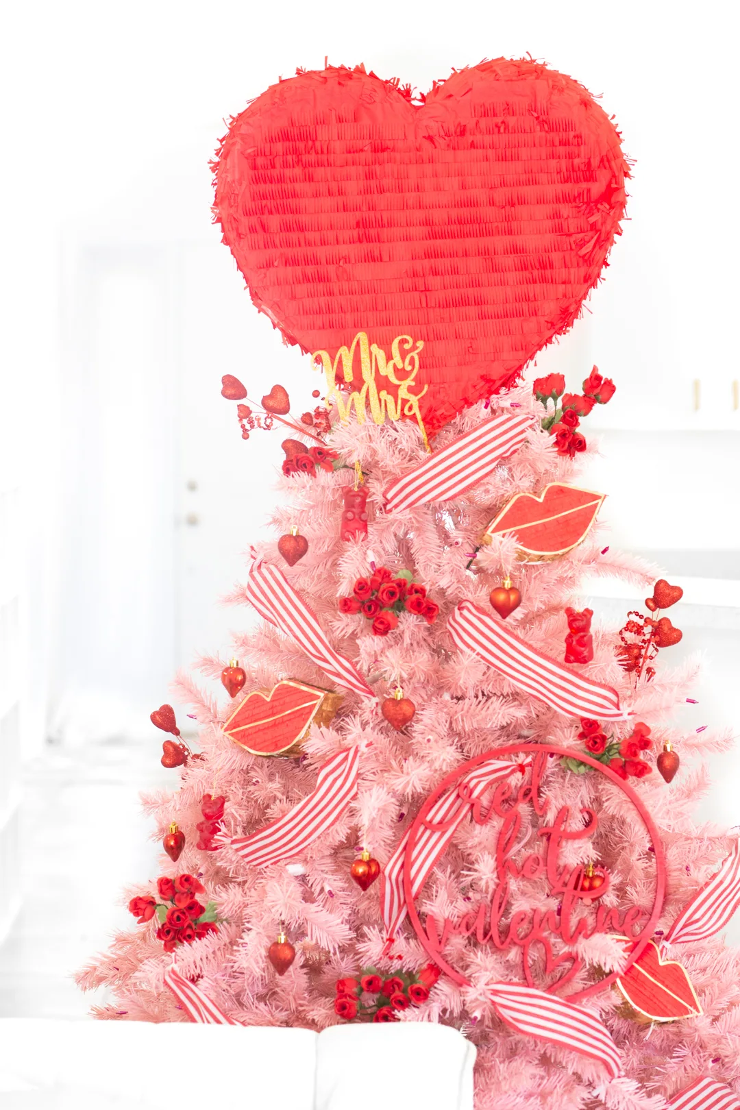 pink valentine's day tree with pinata tree topper