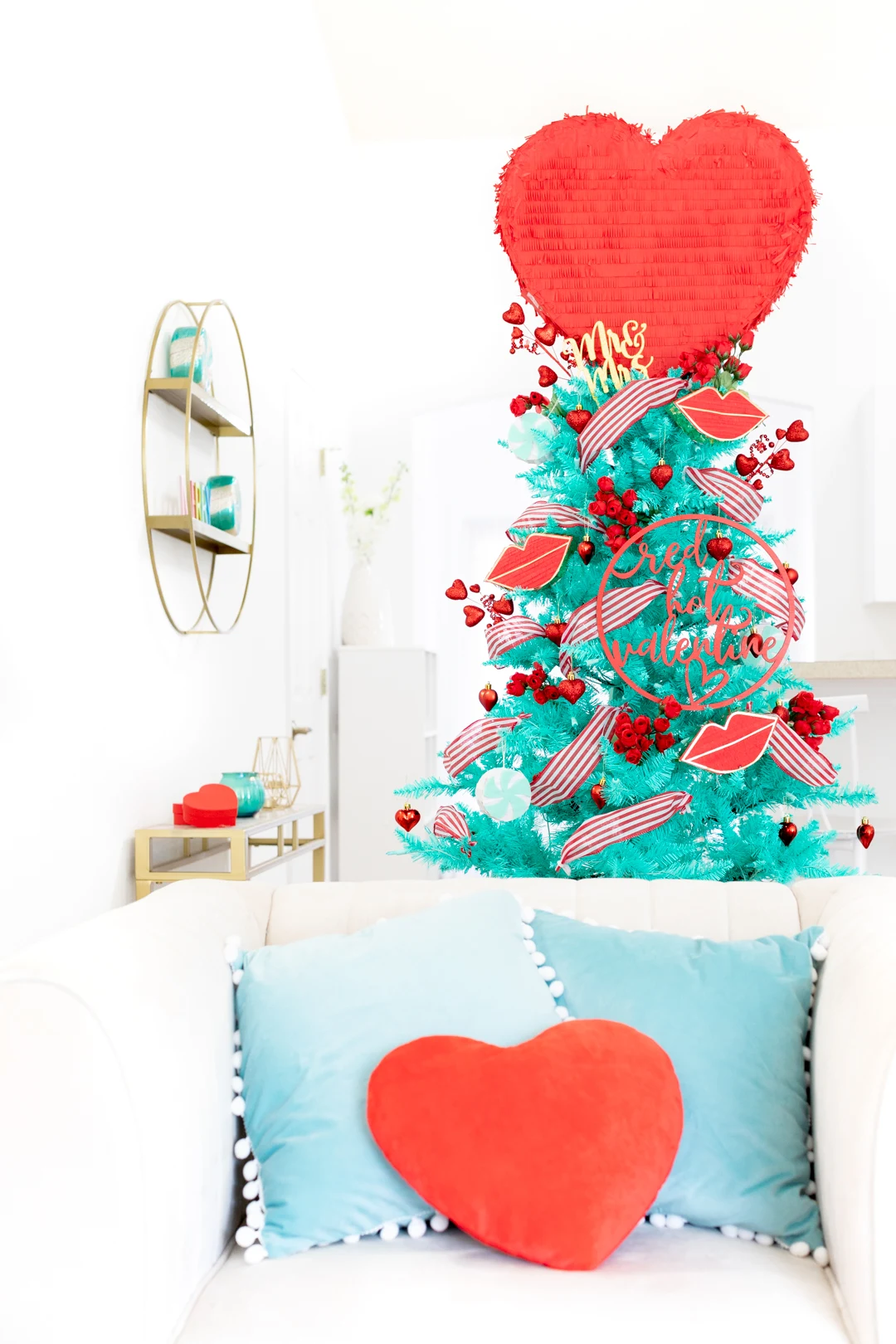 Romantic Valentine's day Christmas tree with big red heart pinata topper. Vintage tree. Cute for newlyweds.