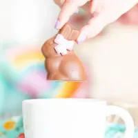 putting chocolate hot cocoa easter bunny into a giant mug