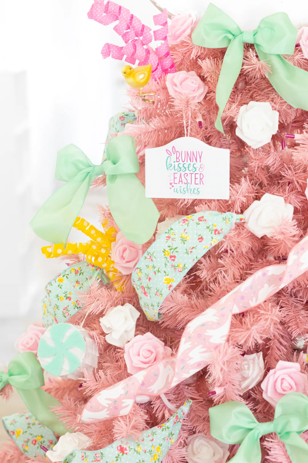 pretty light pink easter tree with pretty pastel decorations.