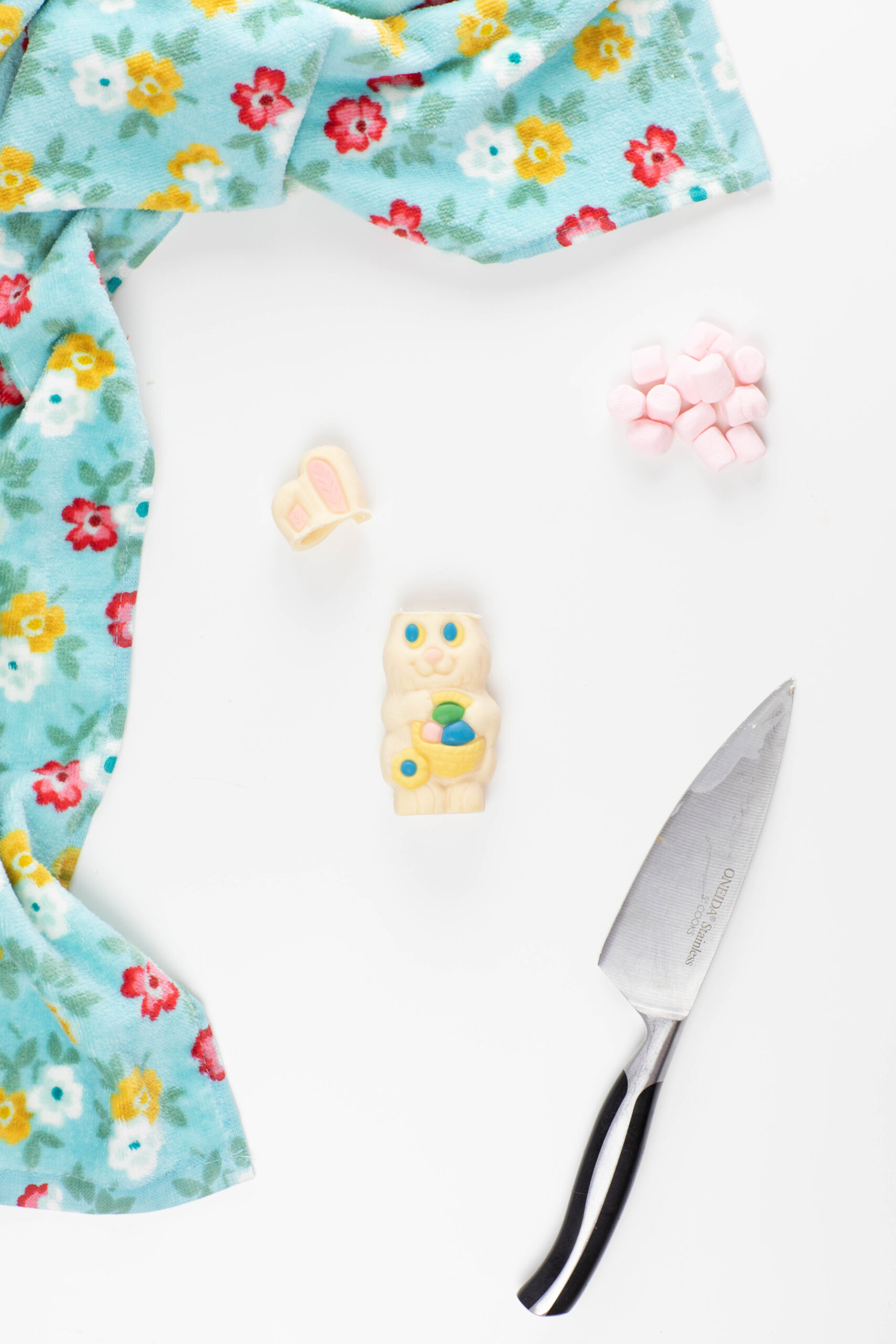 hollow white chocolate bunny with ears melted off with heated knife