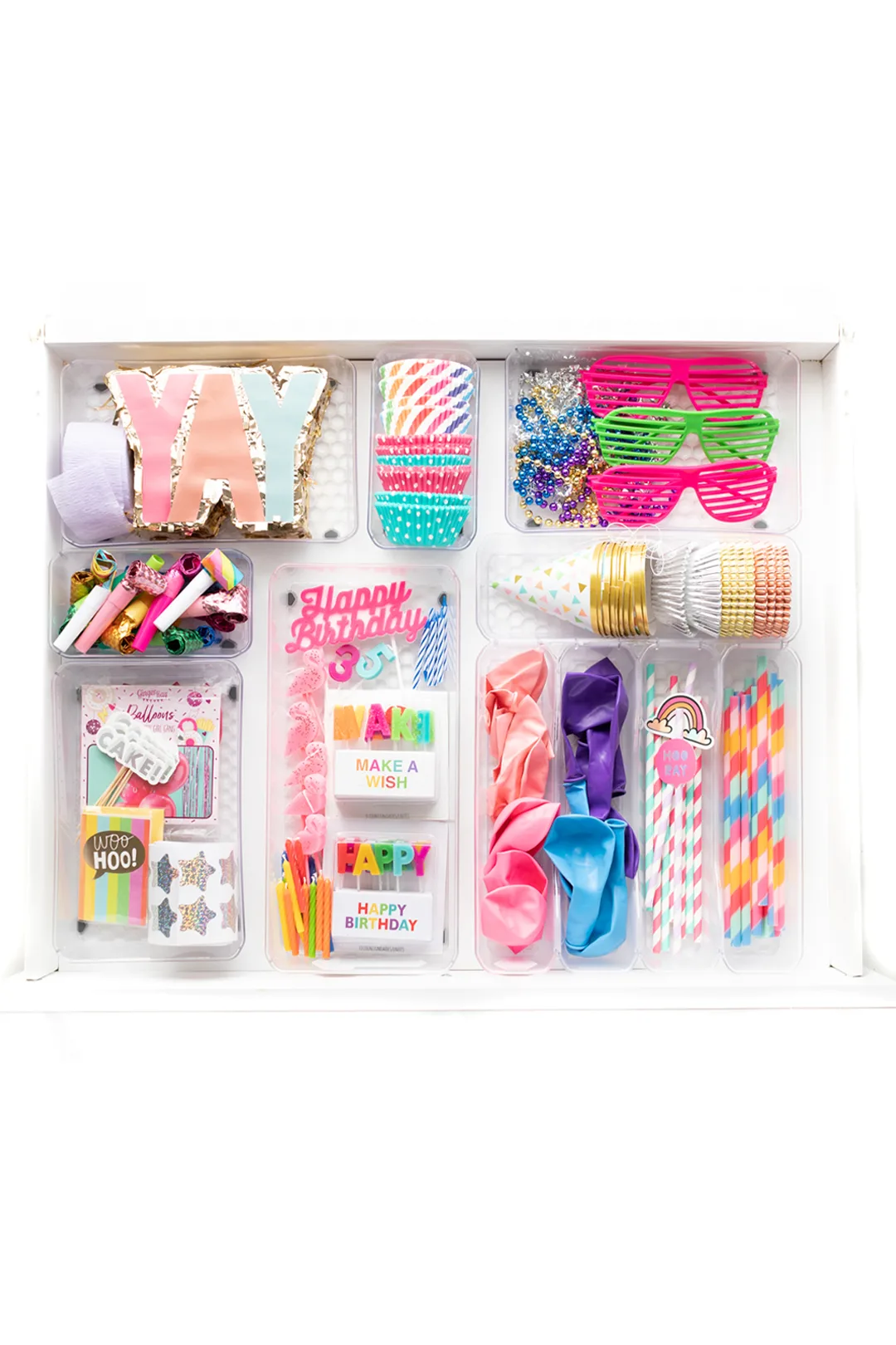 inside view of a celebration drawer. Party supply drawer instead of a junk drawer. Filled with common and basic party supplies for everyday celebrations.