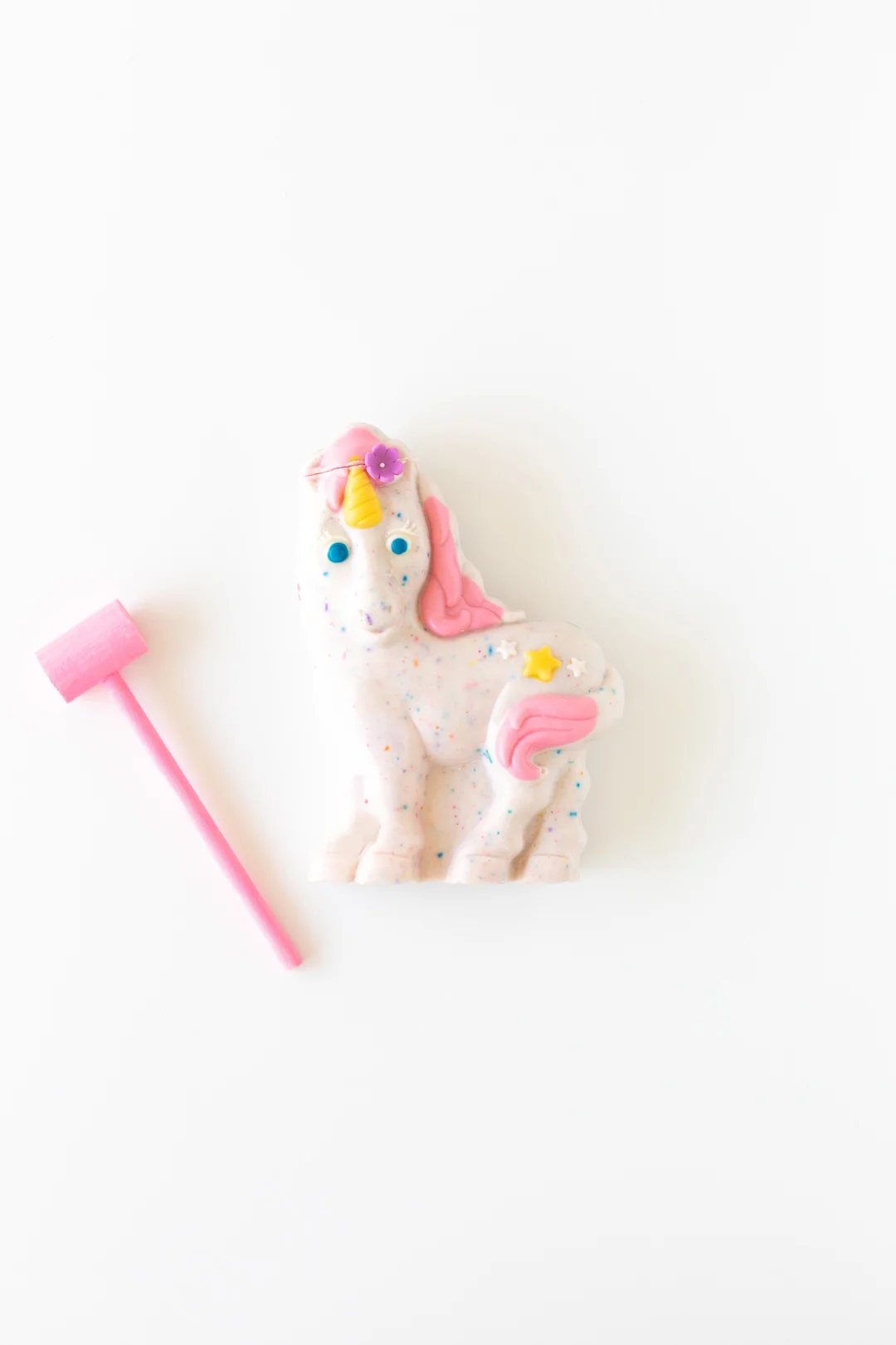 hollow unicorn chocolate with a pink mini mallet