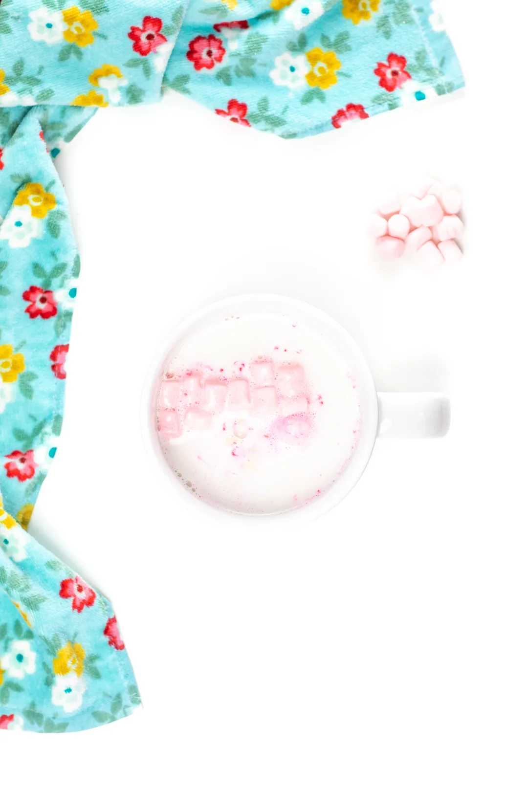 pink mini marshmallows floating in a mug