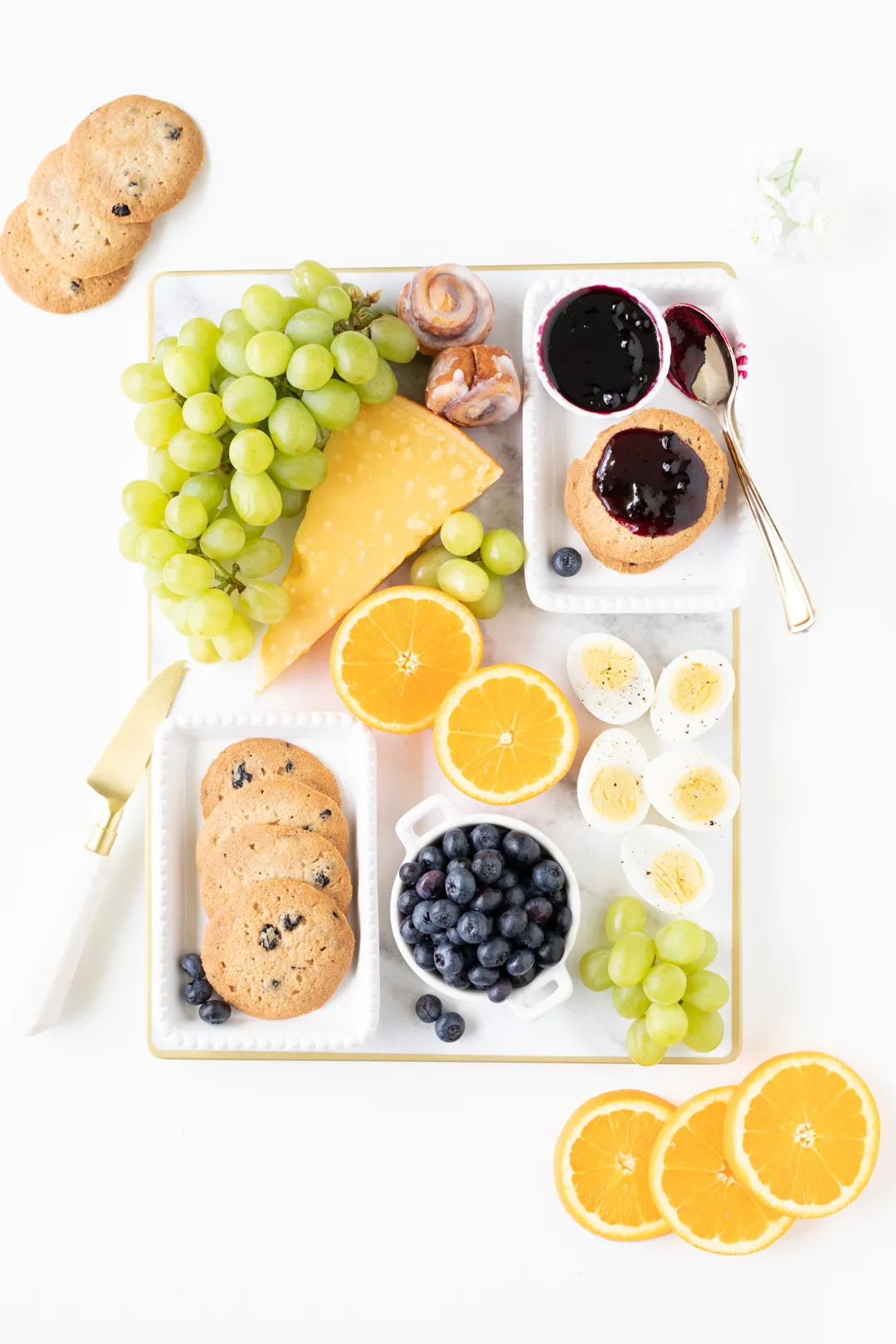 easy brunch tray for every day occasions with blueberries cookies, fresh fruit and hard cooked eggs