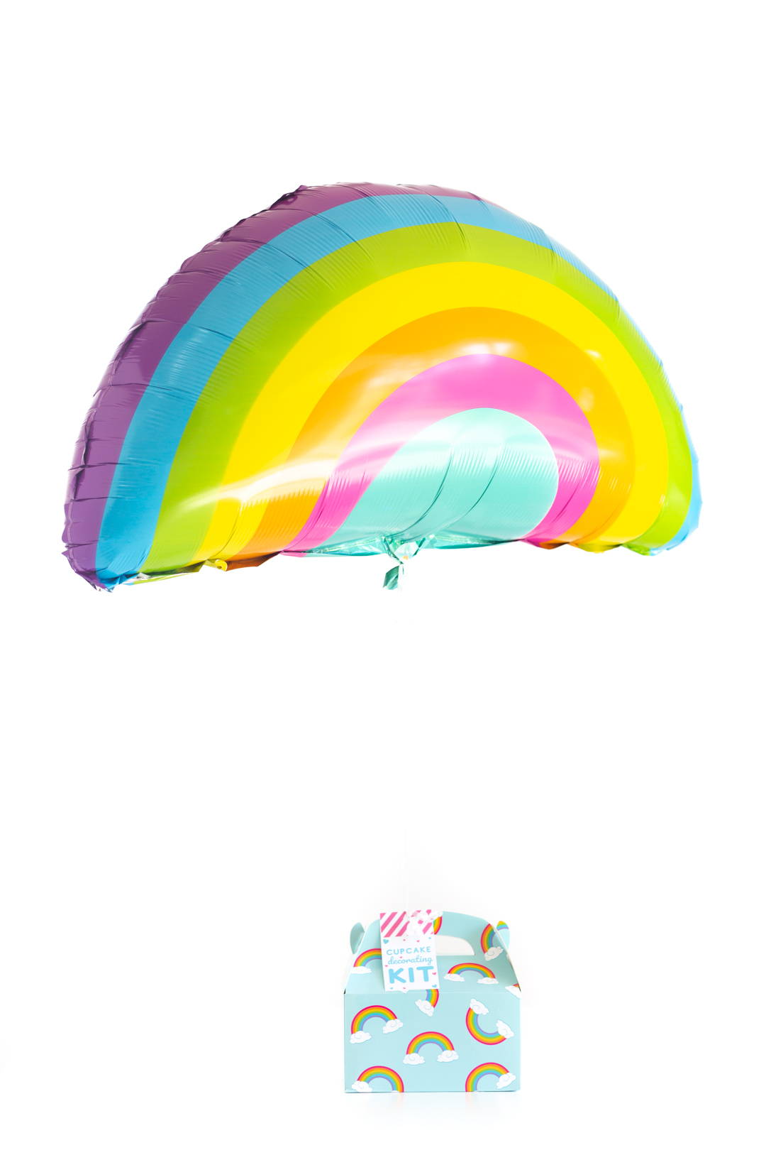 cute diy cupcake decorating kit packed in a rainbow gift box and finished with a cute pastel rainbow balloon