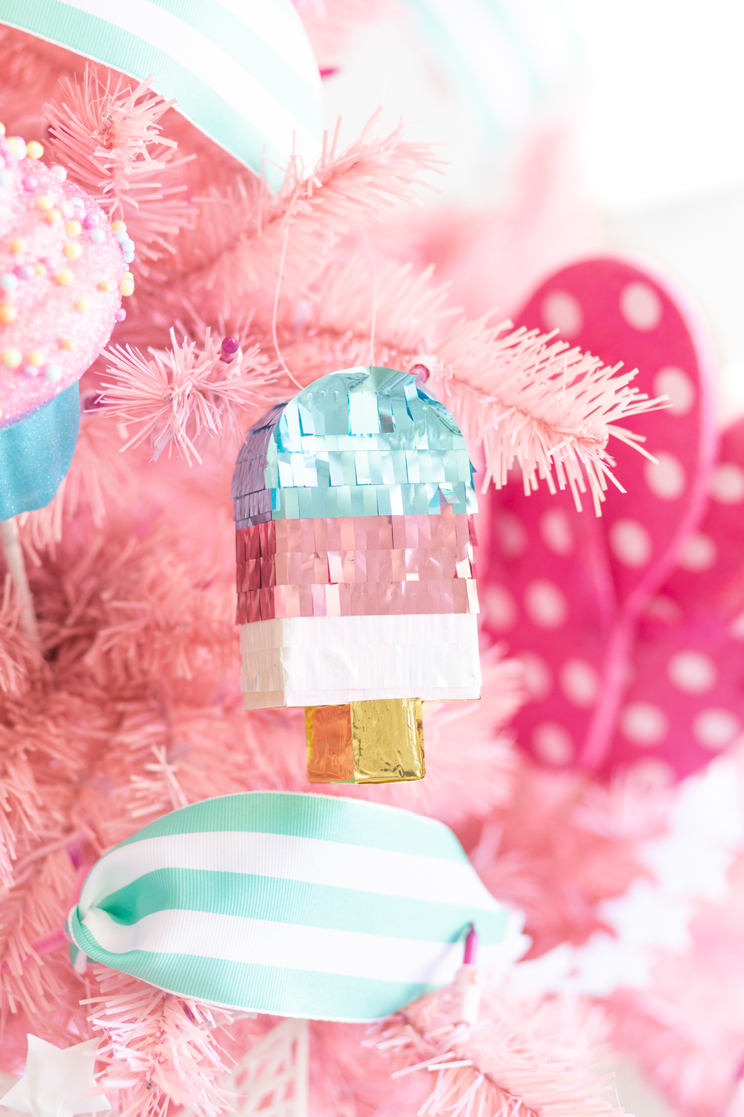 popsicle mini pinata on a pink christmas tree for summer