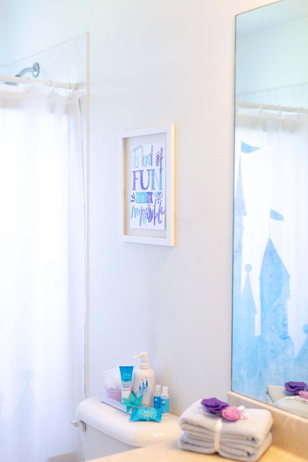 mini disney bathroom makeover with disney inspired accesories.