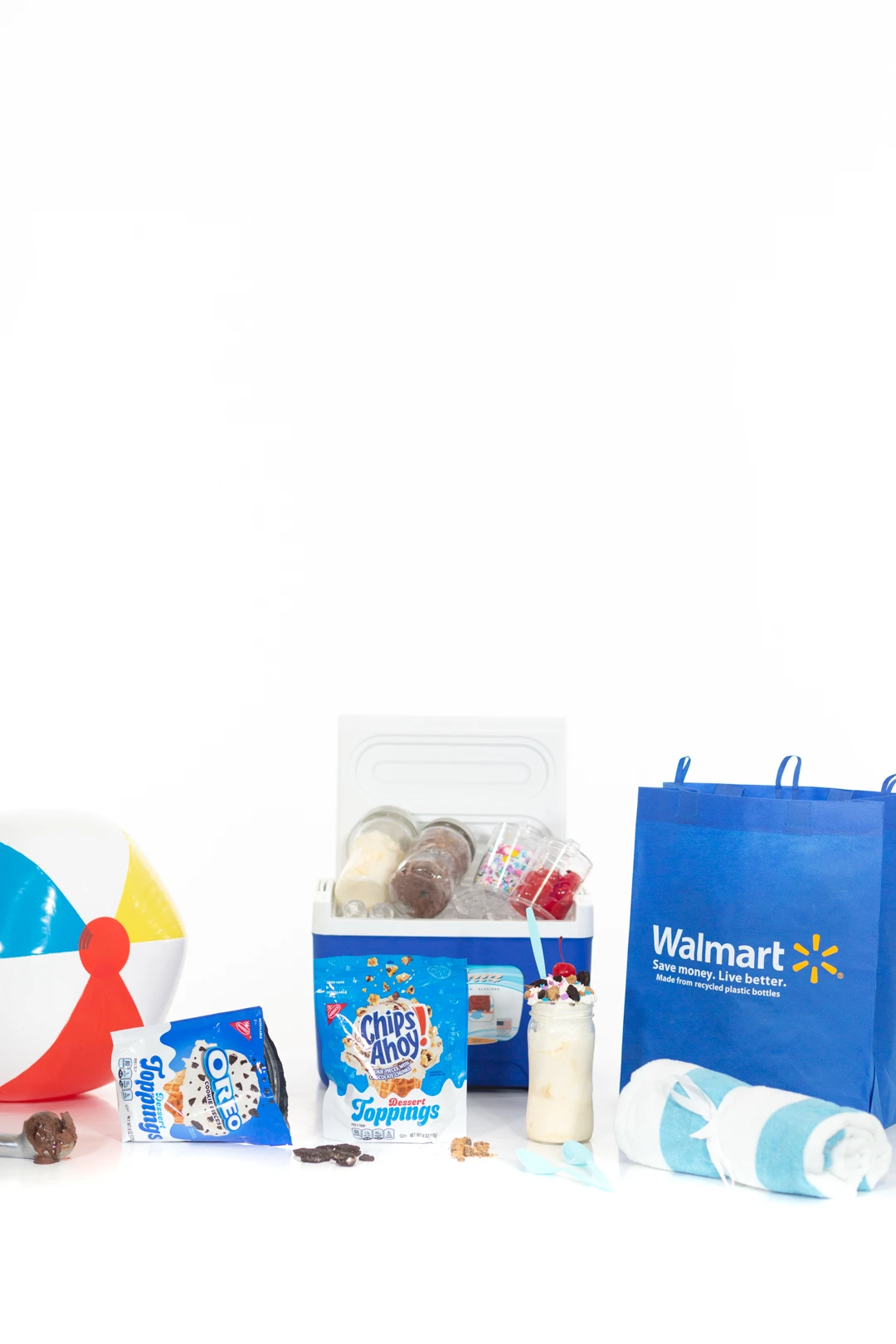 Items needed for portable sundaes with ingredients from Walmart. Walmart reusable shopping back, beach ball and OREO and Chips Ahoy! Dessert Toppings