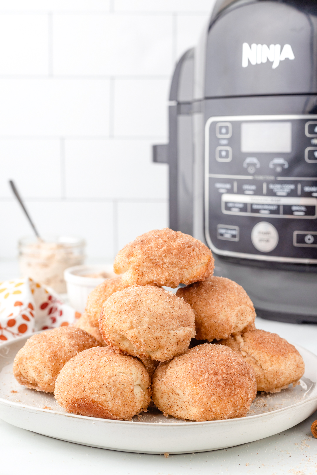 plate loaded with pumpkin spice donut bites