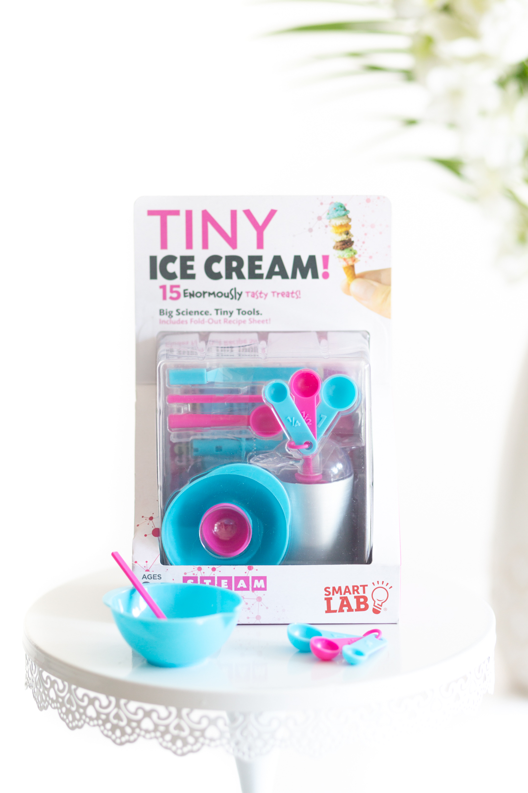 tiny ice cream kit in packaging with tiny mixing bowl and spoon and tiny measuring spoons 