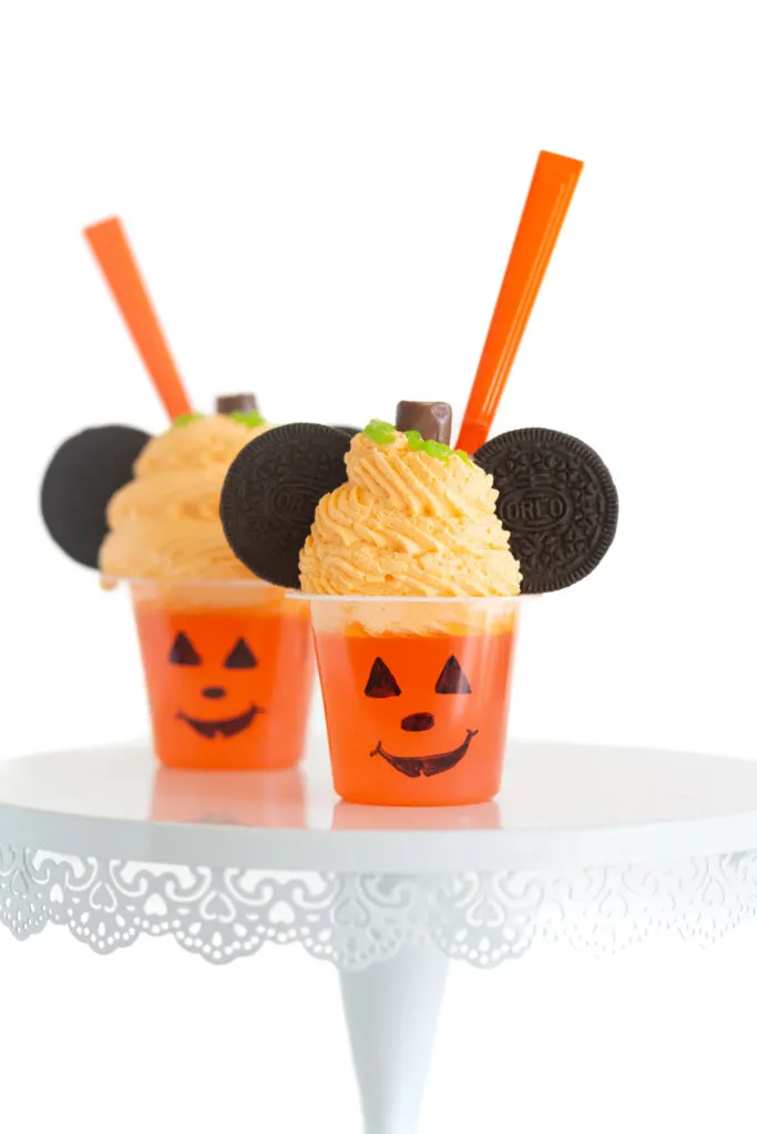 gelatin cups decorated like pumpkin mickey mouse treats Oreo cookies for mickey mouse ears.