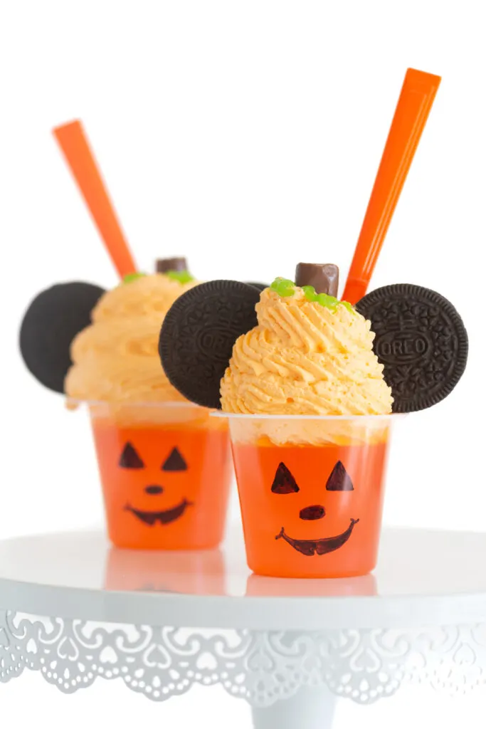 up close view of mickey mouse halloween treat that look like pumpkins