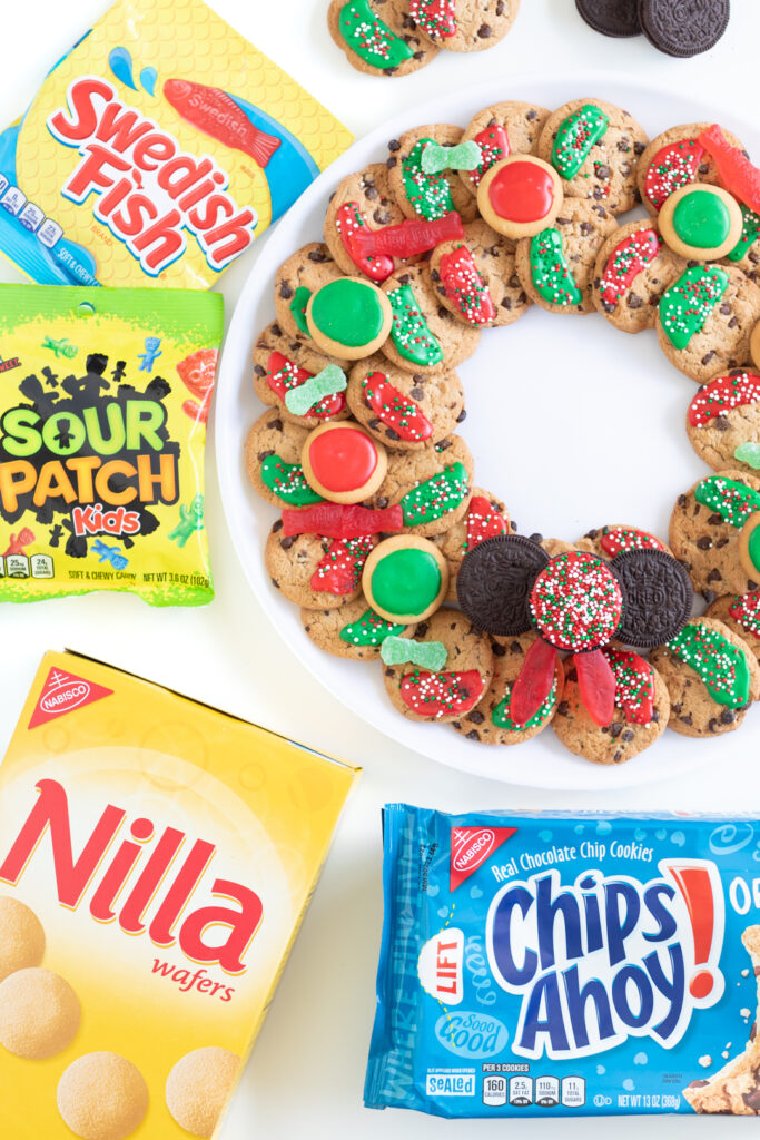 festive cookie platter displayed with packages of swedish fish, sour patch kids, nilla wafers, chips ahoy!
