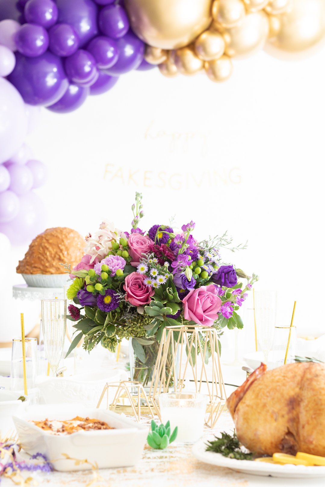 Pretty bouquet of flowers being showcased on a fakesgiving party table