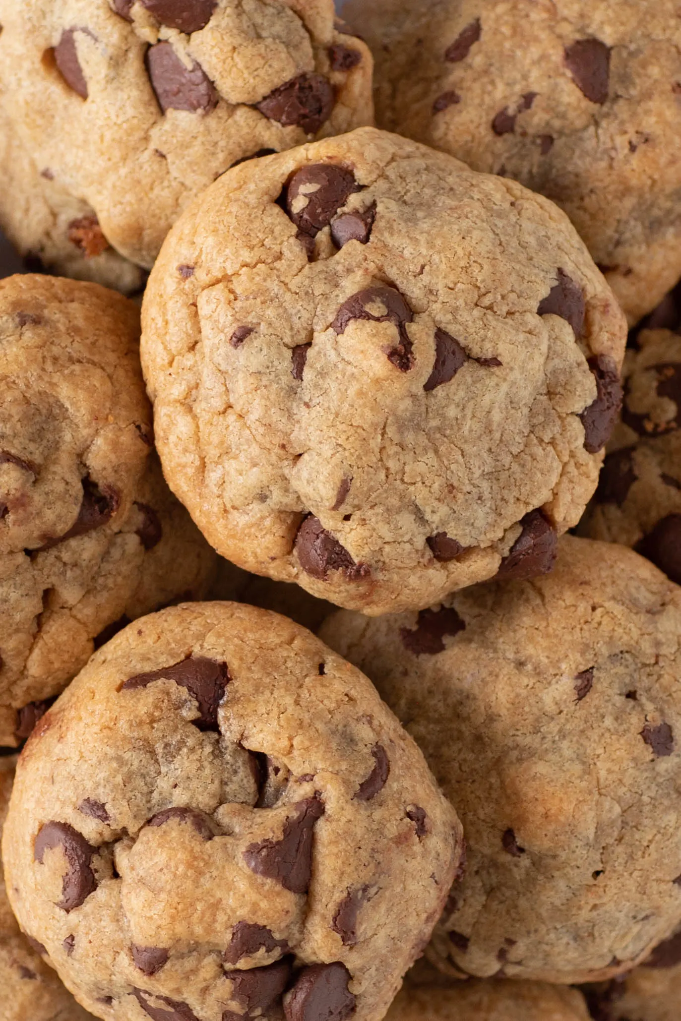 up close view of plate of thick 4 ingredient chocolate chip cookies