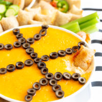 basketball shaped dip in a round bowl for a basketball charcuterie board