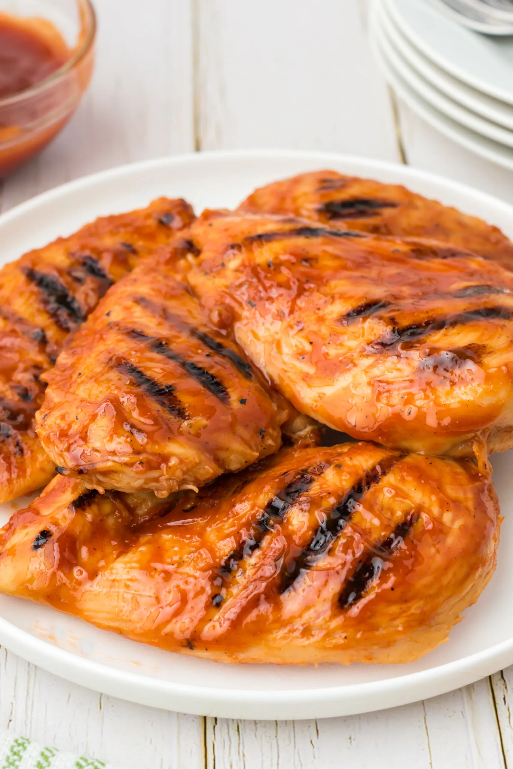 up close view of bbq grilled chicken on a serving dish