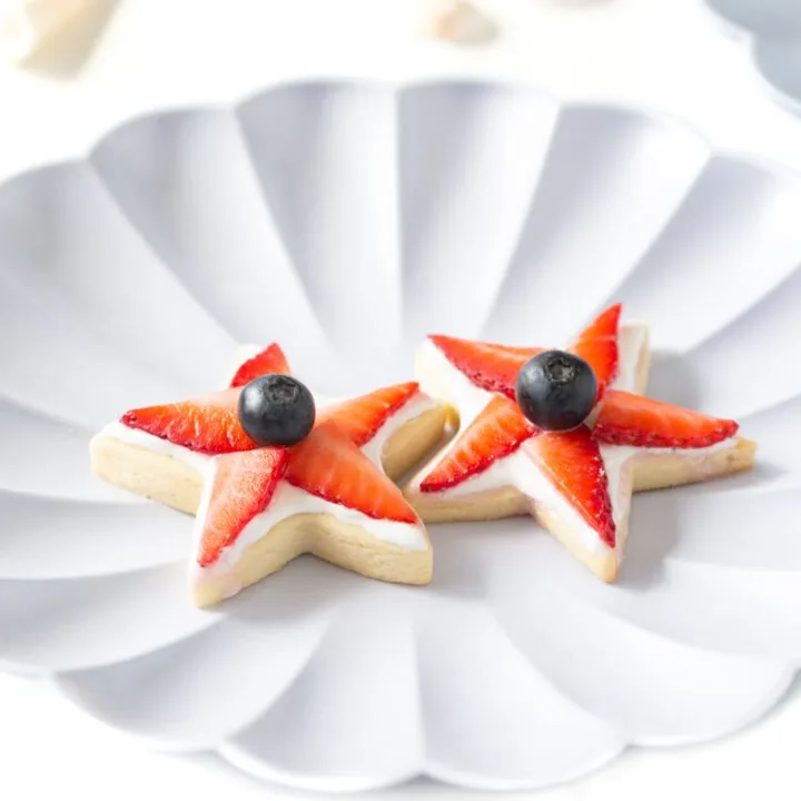 fruit star cookies on a shell party plate