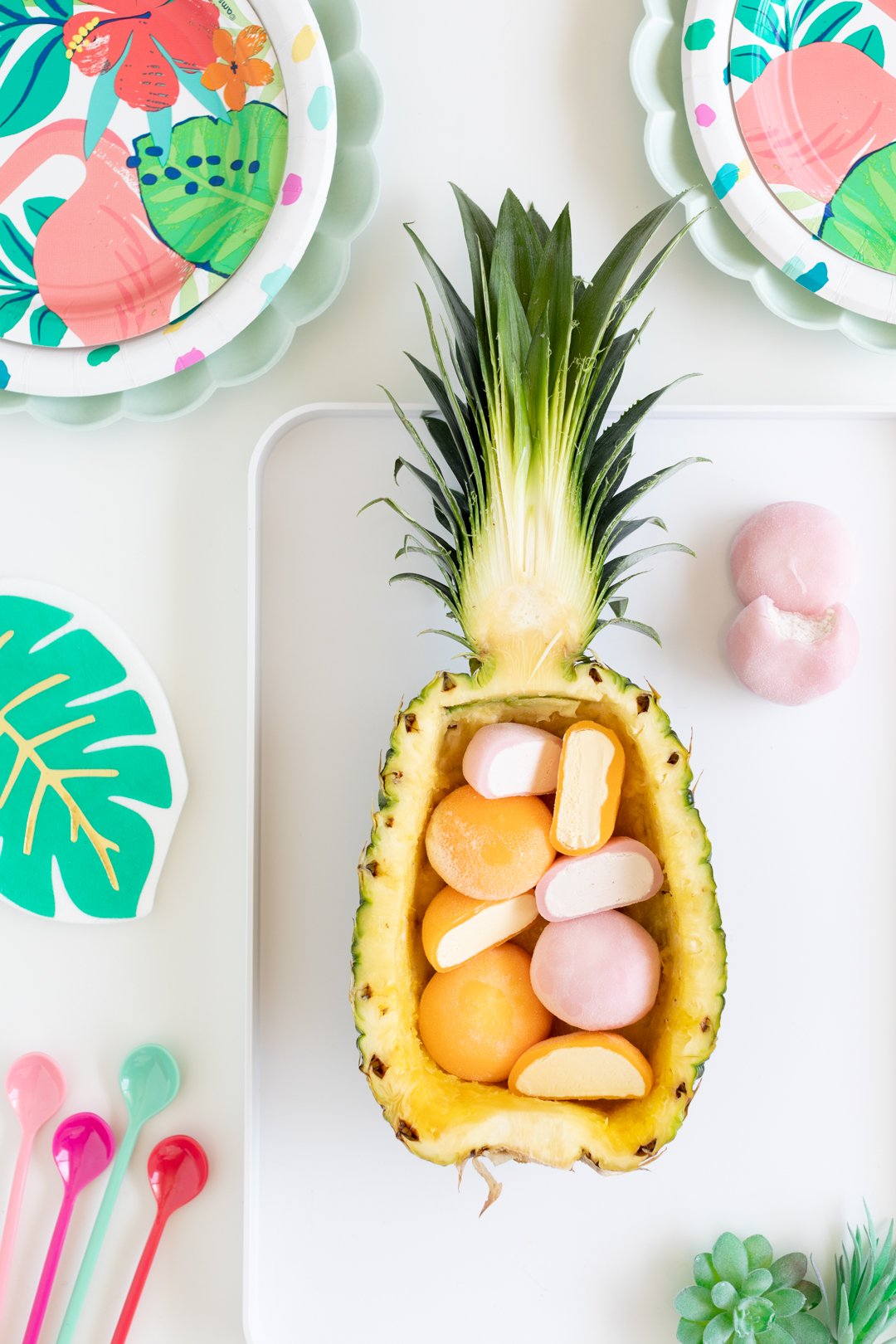 halved pineapple sundae being made with mochi